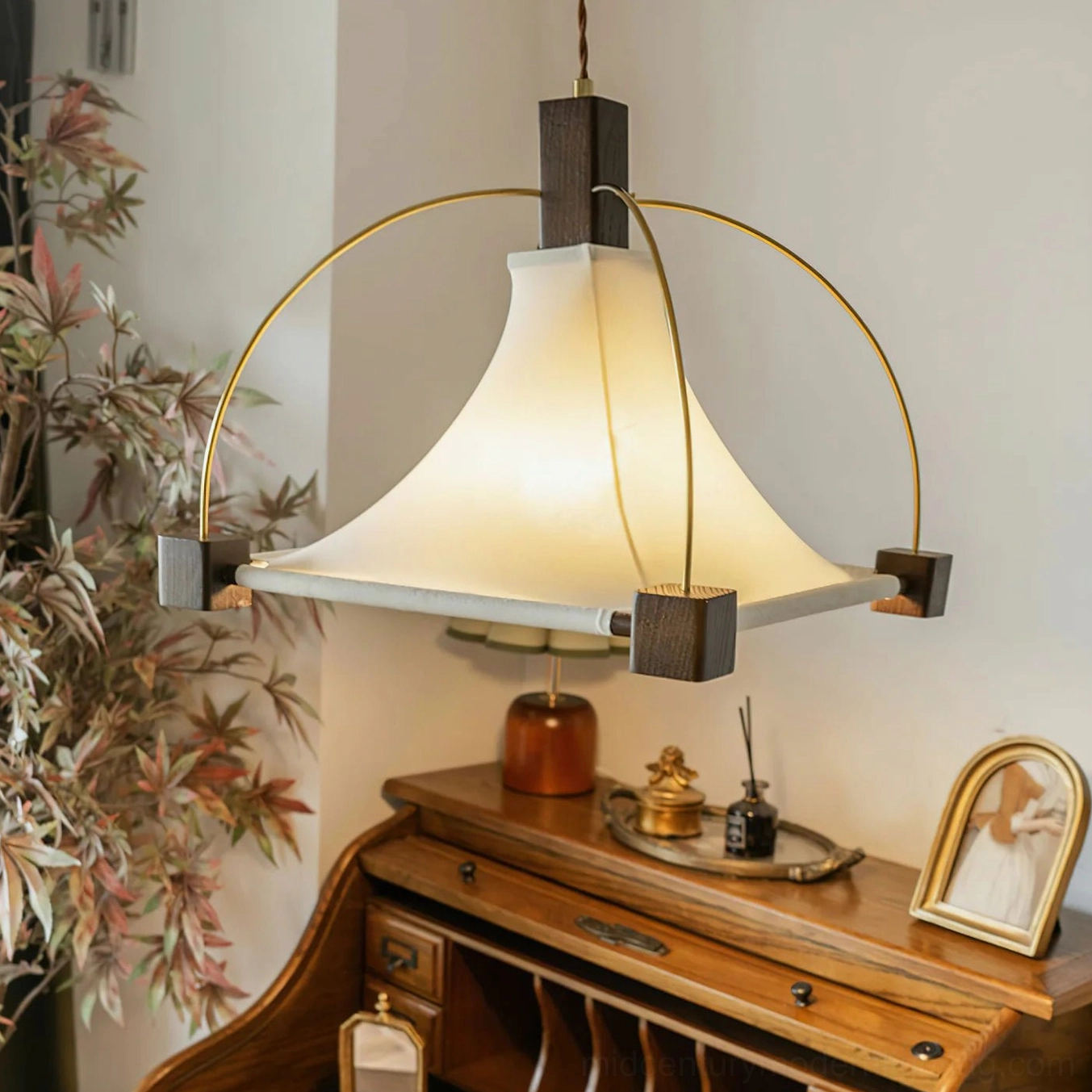 Fabric pendant light with warm glow vintage wooden interior styling