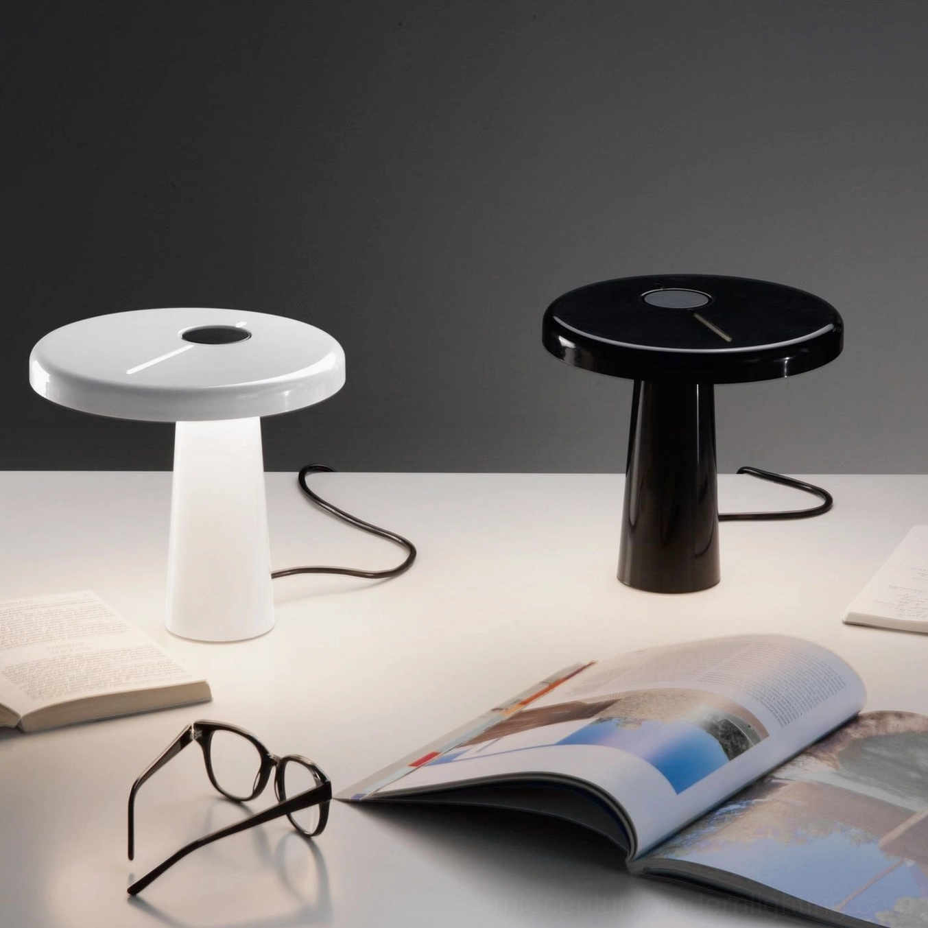 Hoop asymmetrical LED table lamp installed on bedroom dresser with warm 3000K light emission