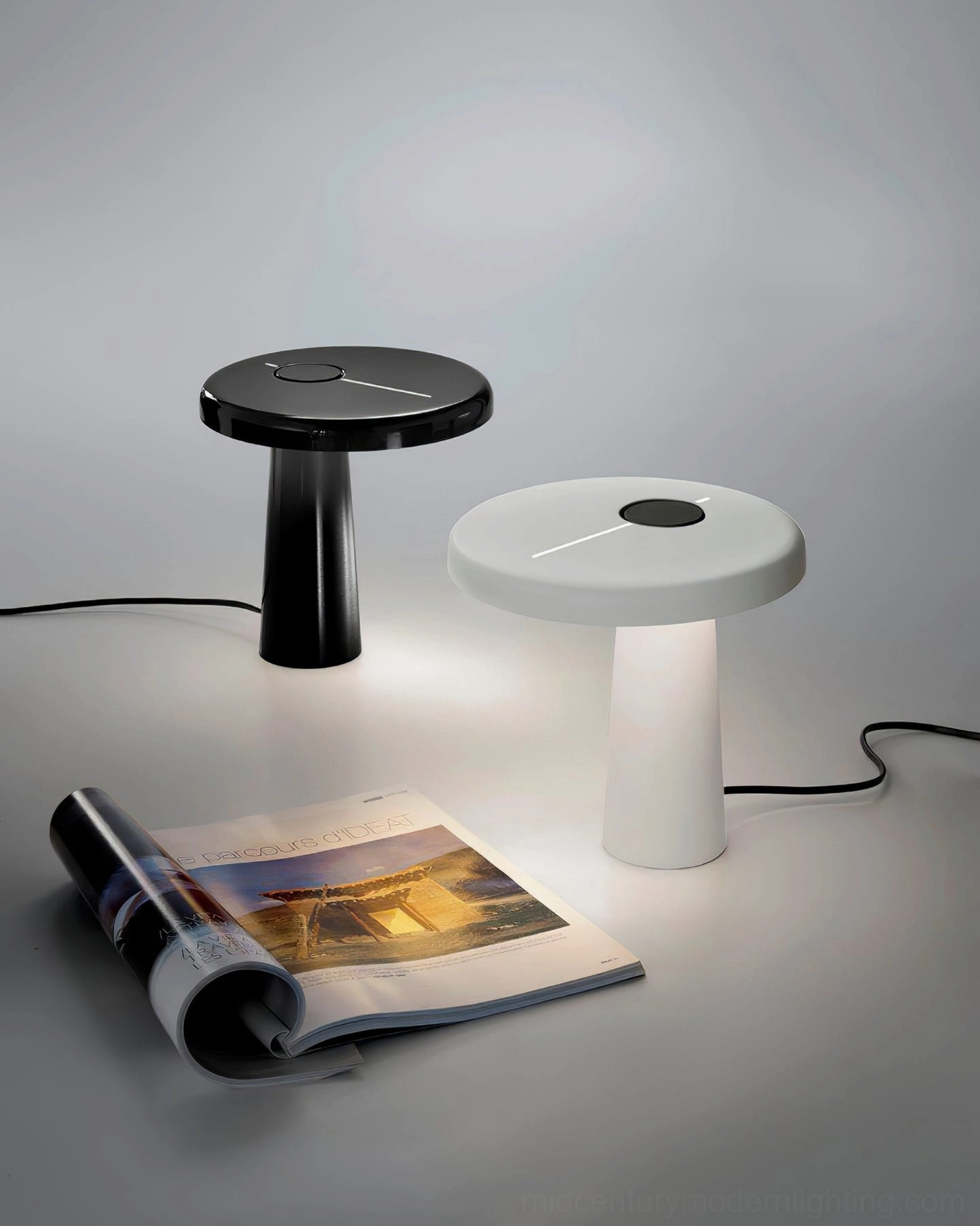 Hoop LED table lamp on home office desk with stationery, combining form and function design