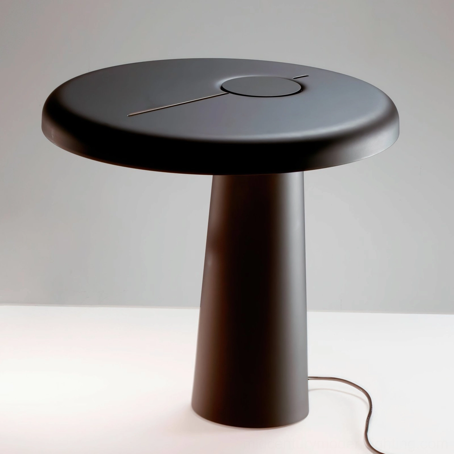 Hoop LED table lamp full product shot on neutral background, minimalist asymmetrical lighting