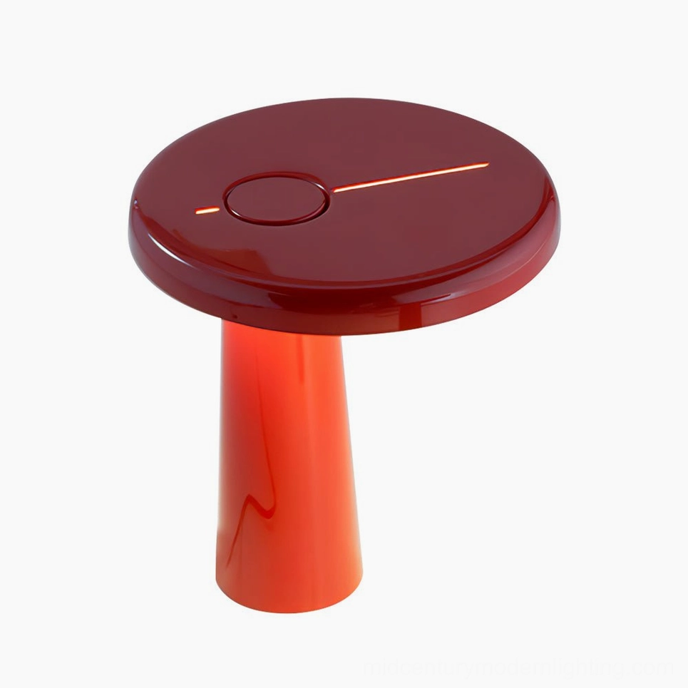 Hoop LED table lamp red finish variant on desk setup with modern accessories