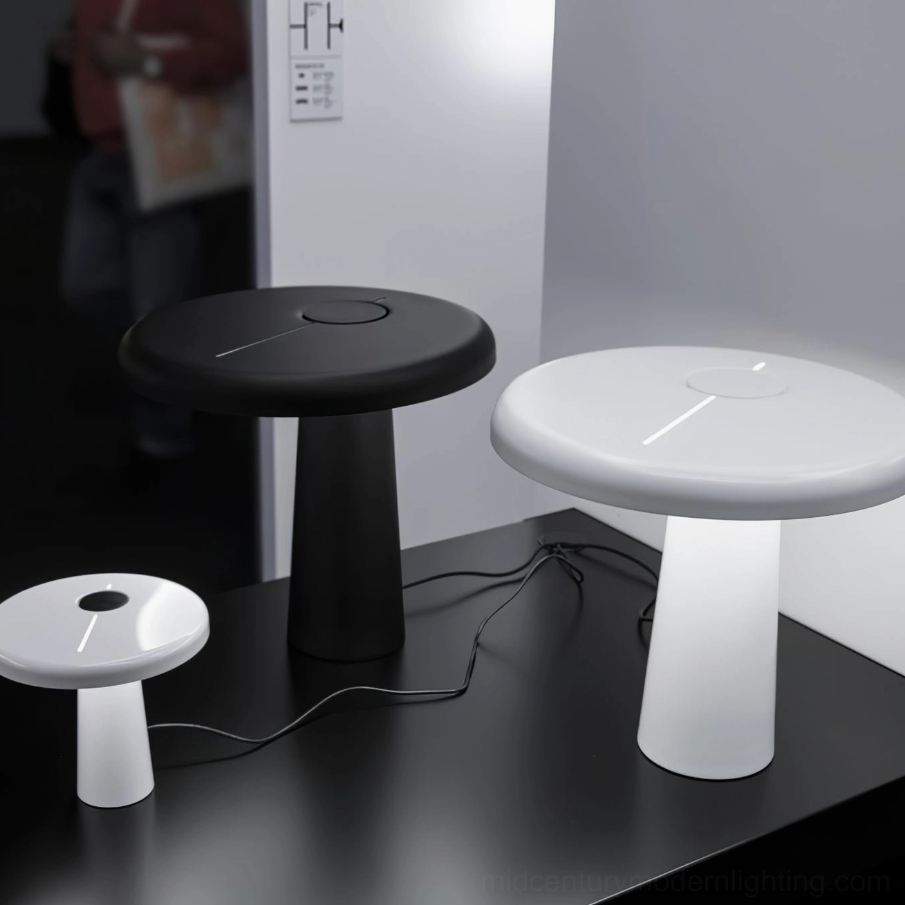Hoop LED table lamp side profile view highlighting mushroom-shaped design and asymmetry