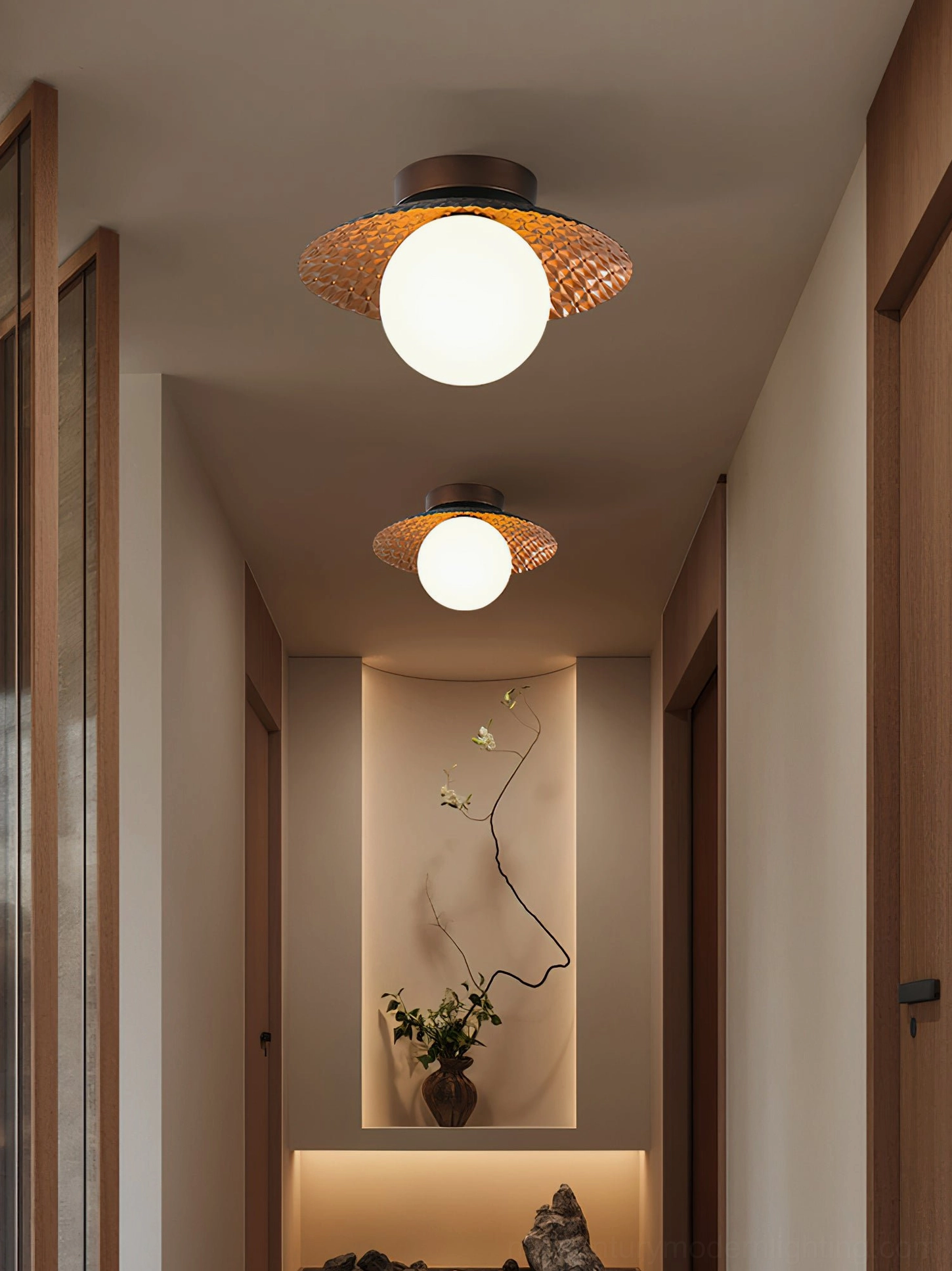 Multiple Hooper ceiling lamps arranged in warm traditional residential hallway with decorative niche and corridor lighting design