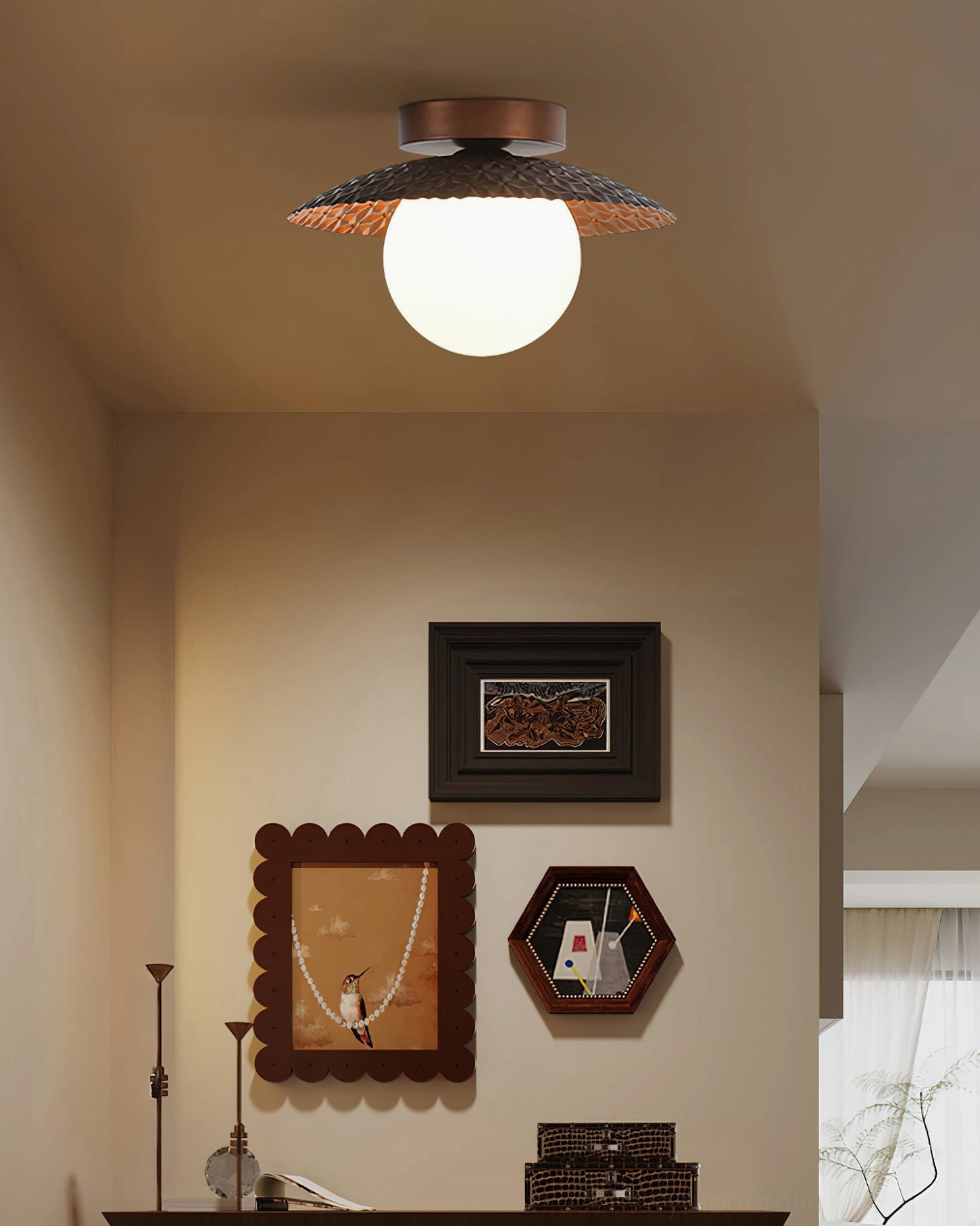 Hooper sculptural ceiling lamp in wabi-sabi warm interior space with framed wall artworks and neutral home decor