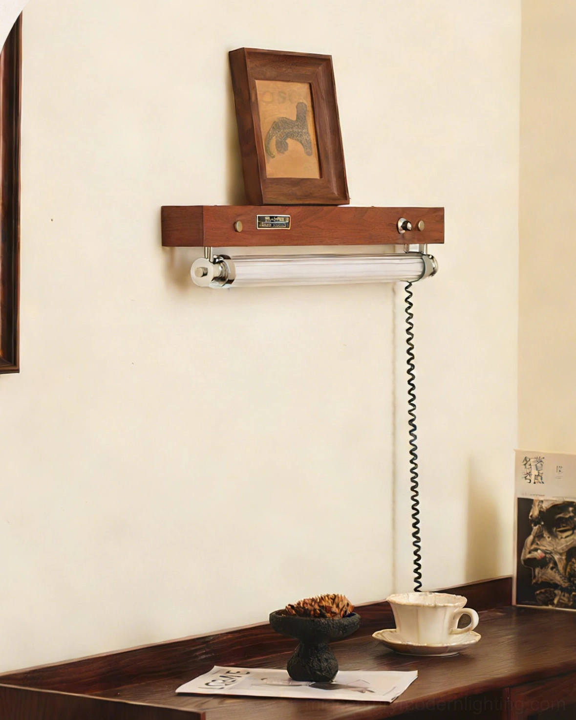 Unlit Hopper walnut sconce side view showing metal-glass construction and mounting bracket design