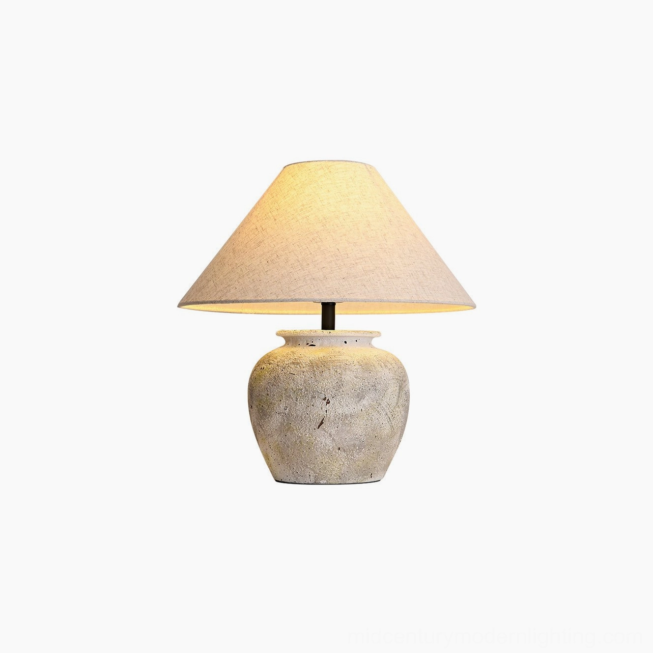 Houa ceramic table lamp hero shot - artisanal ceramic base with natural linen shade