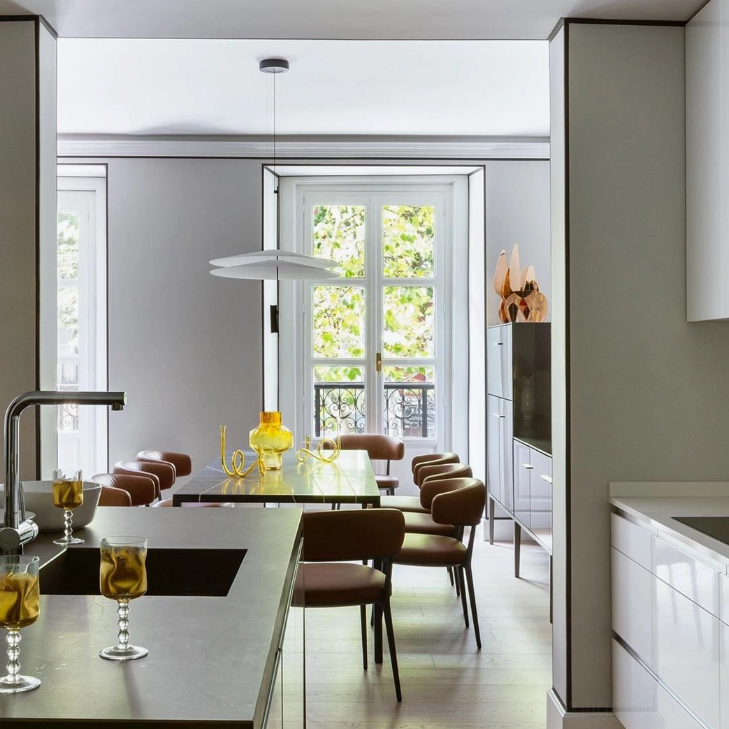 Hover Disc pendant with ambient lighting creating soft shadows and diffused illumination pattern