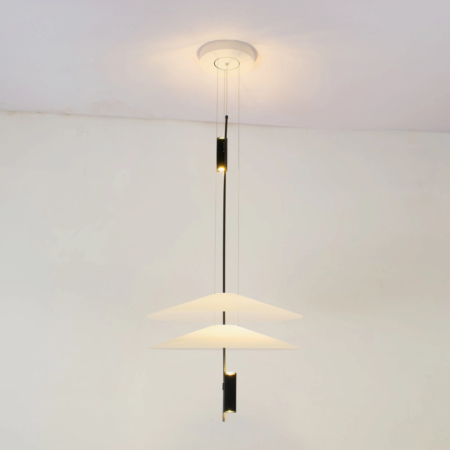 Hover Disc pendant chandelier component breakdown showing discs, hardware, and assembly elements