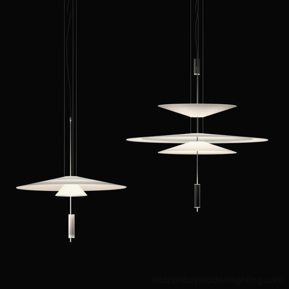 Hover Disc pendant chandelier installation showing correct height and proportion above dining area