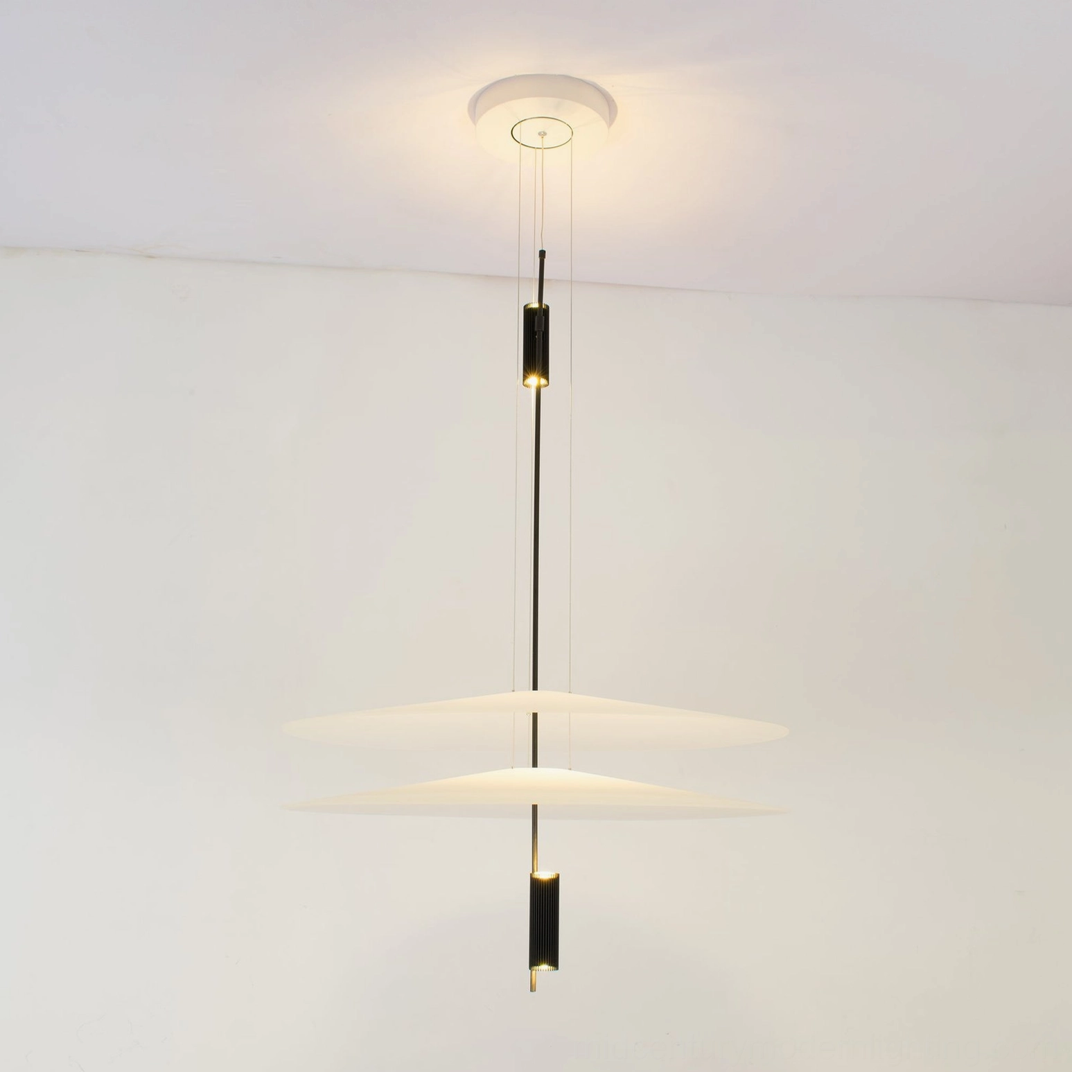 Hover Disc pendant chandelier interior lighting detail with LED illumination through diffuser disc