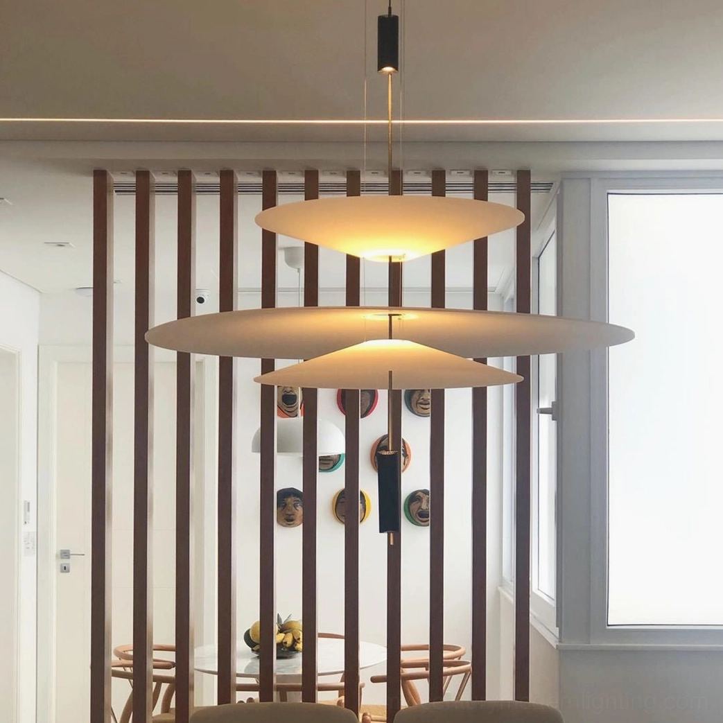 Hover Disc pendant in mid-century modern interior setting with complementary furnishings