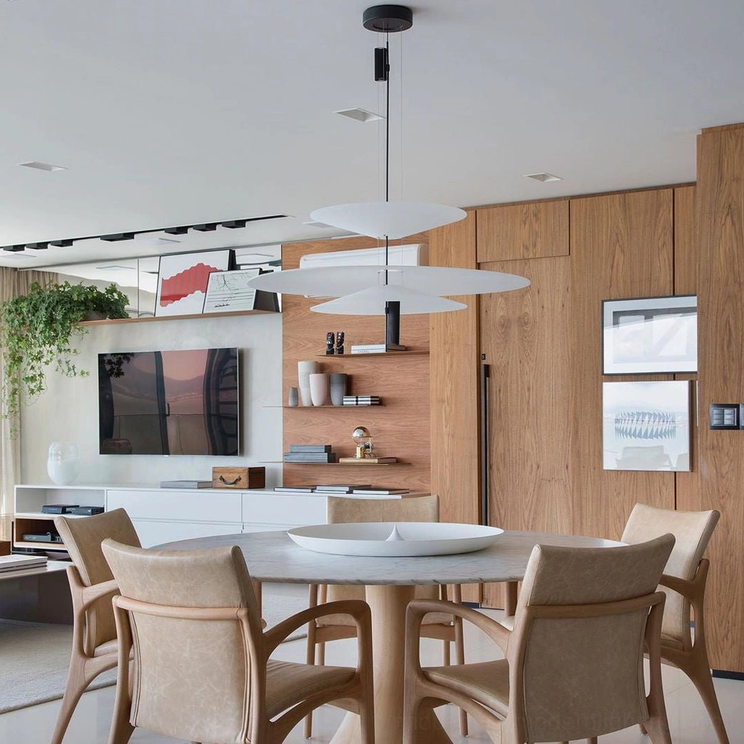 Vertical stacked Hover Disc chandelier viewed from below with sleek black metal suspension hardware and white acrylic