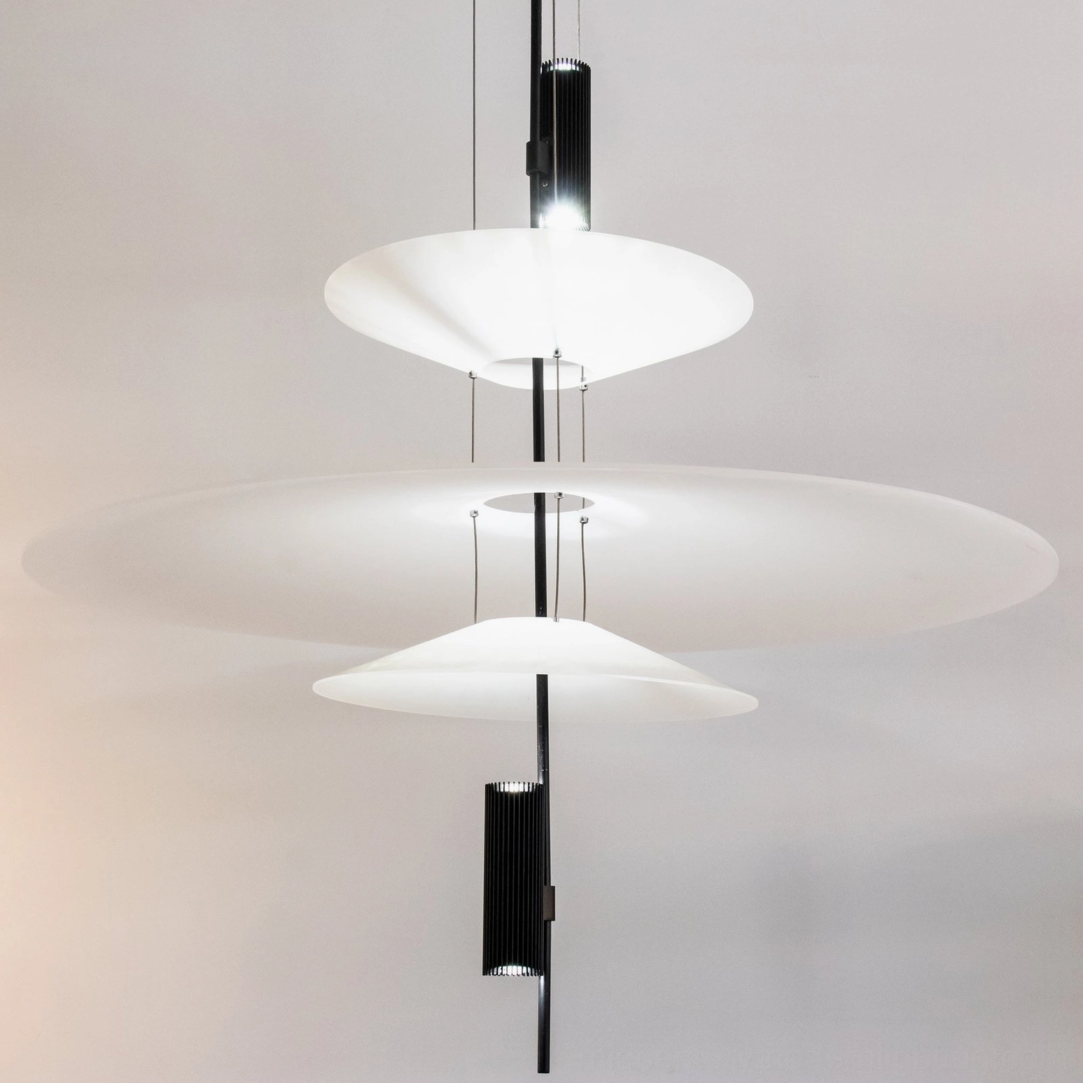 Hover Disc pendant chandelier arrangement showing multiple styles and finish variations together