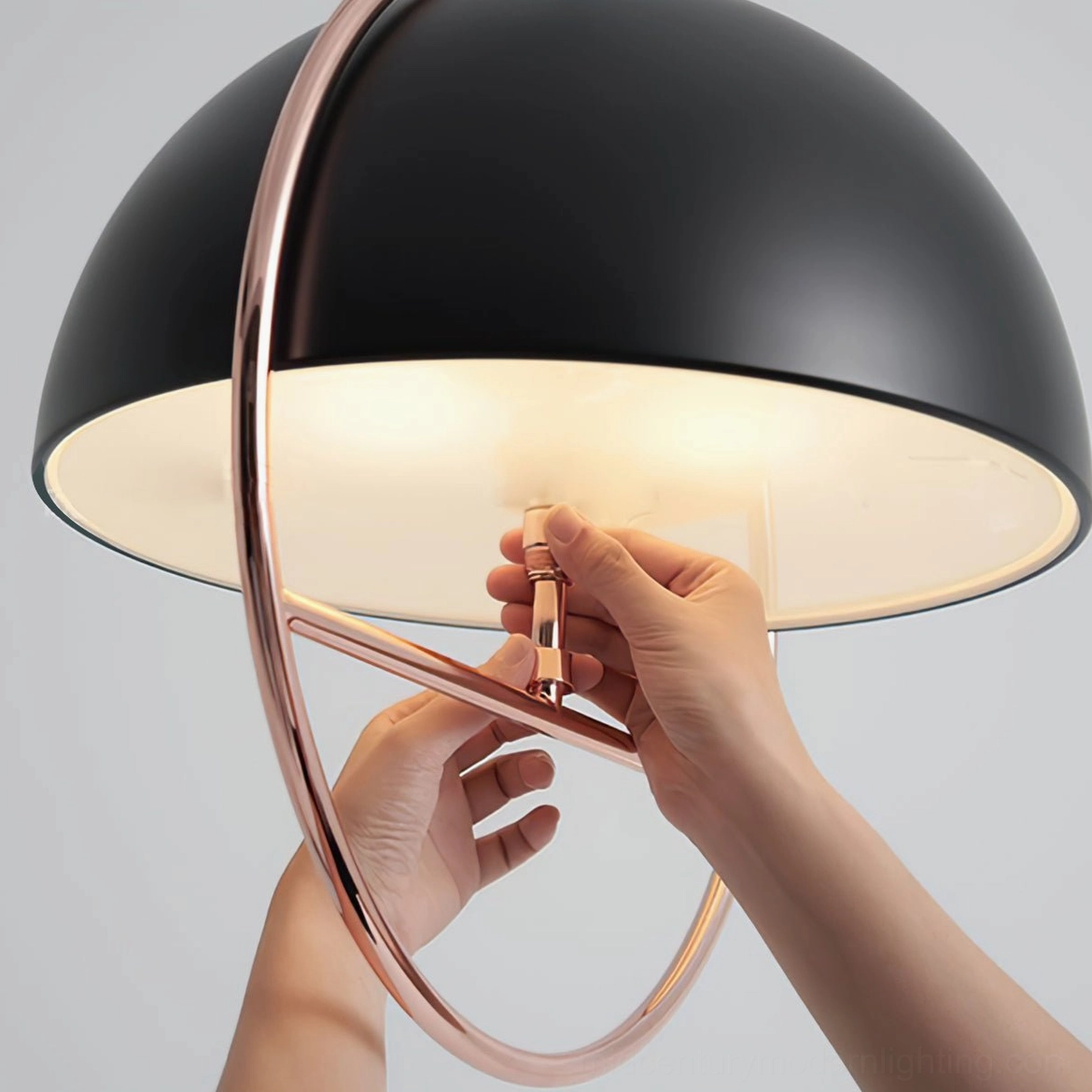 Modern spherical pendant light creating ambient lighting in open concept home space