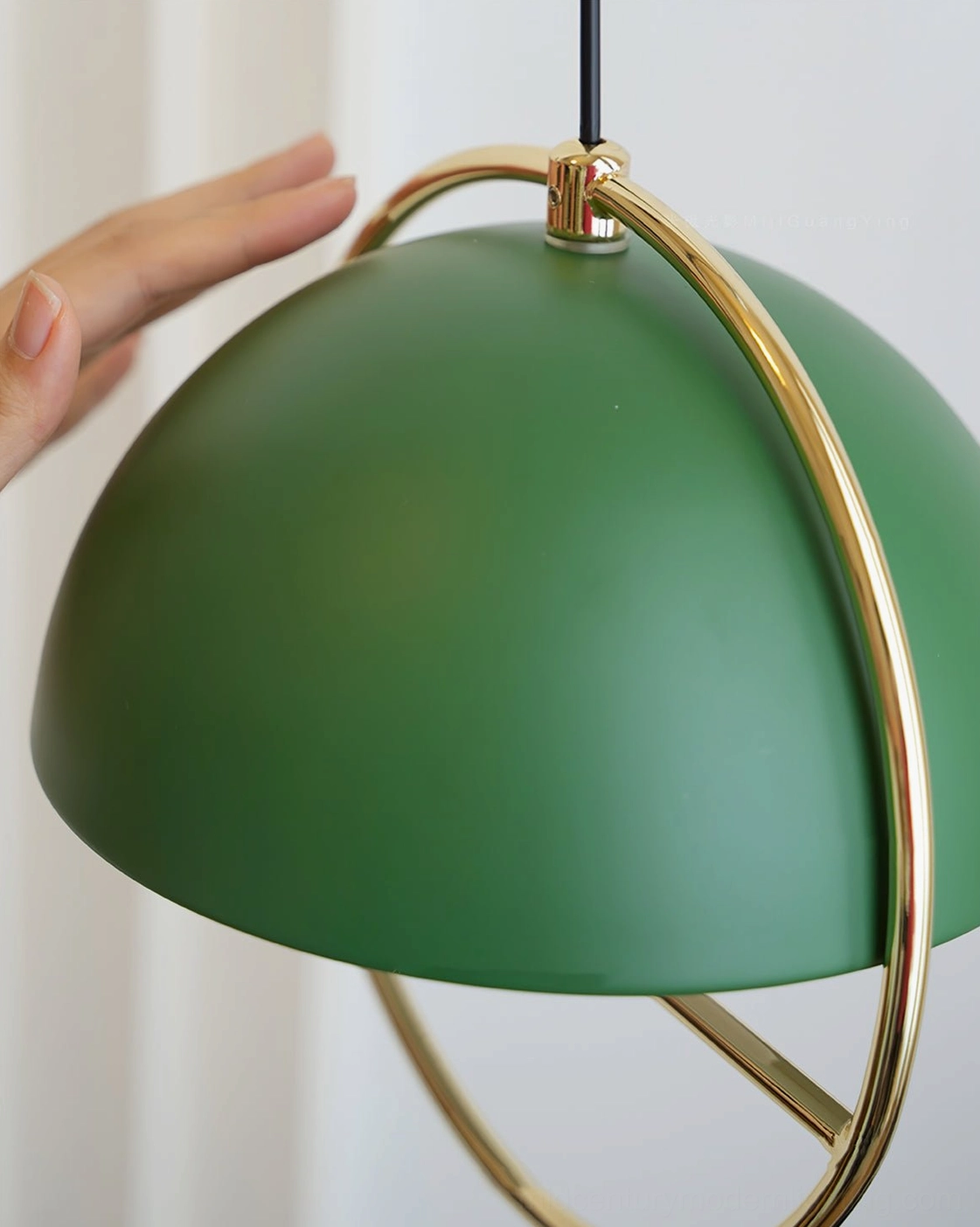 Huan pendant lamp styling in contemporary interior space with minimalist furniture and clean lines