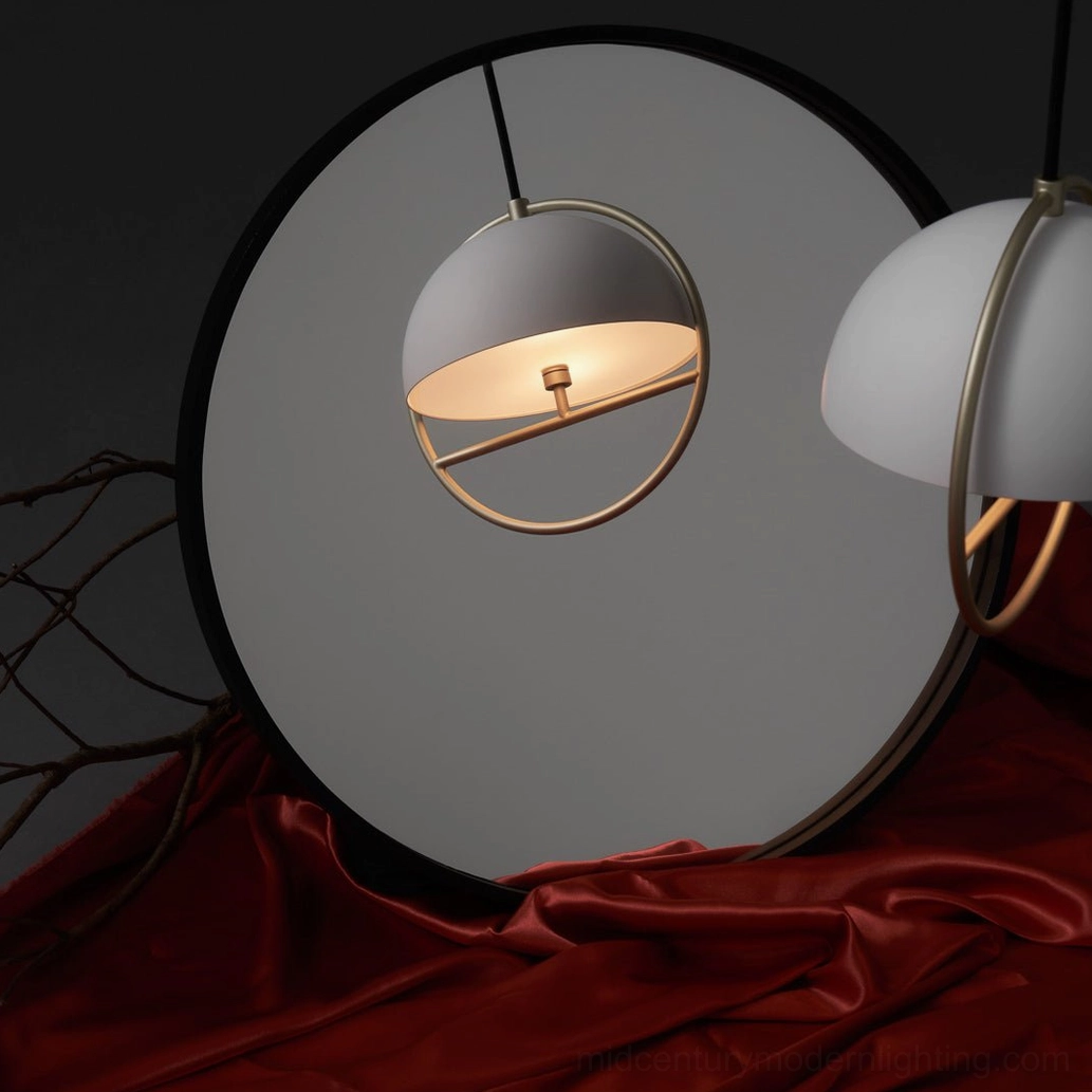 Vintage style light grey dome pendant lamp with brass metal frame shown through round mirror reflection