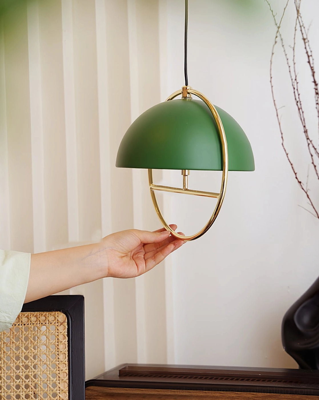 Modern spherical pendant light fixture demonstrating contemporary geometric design and sculptural form