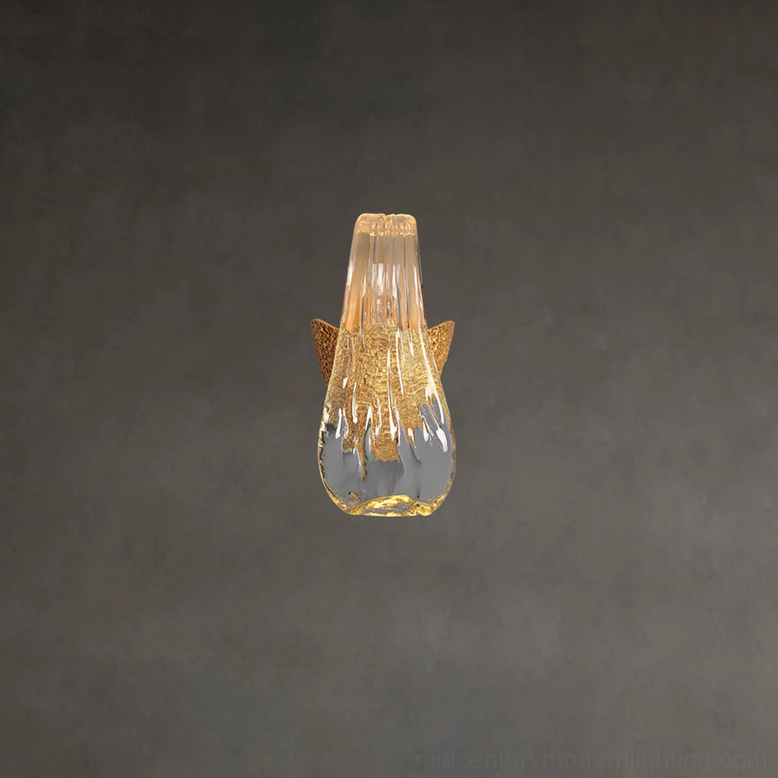 Icarus droplet glass wall lamp glowing with warm light on dark gray solid background