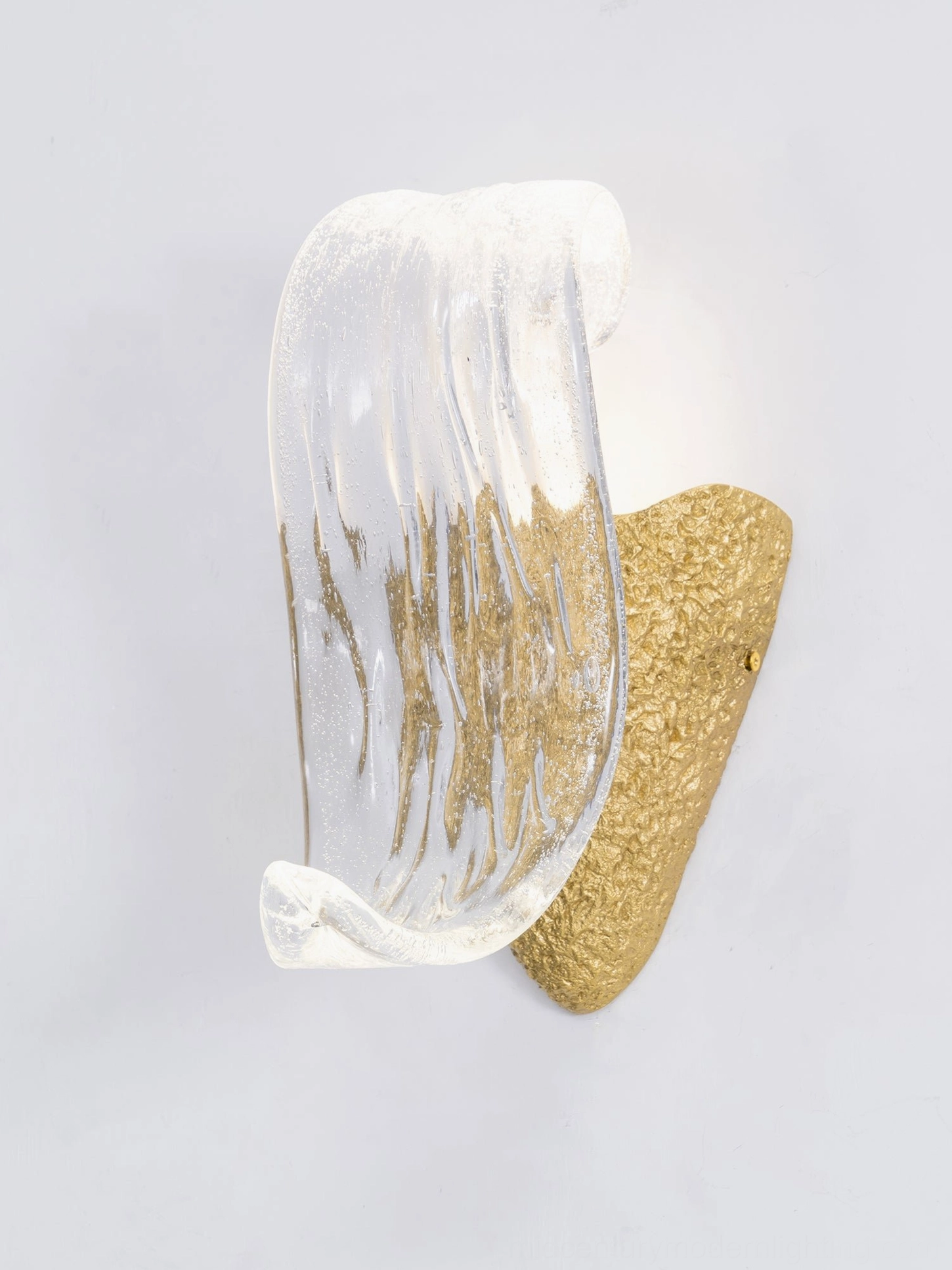 Icarus glass wall sconce front profile showing droplet shape and brass mounting hardware