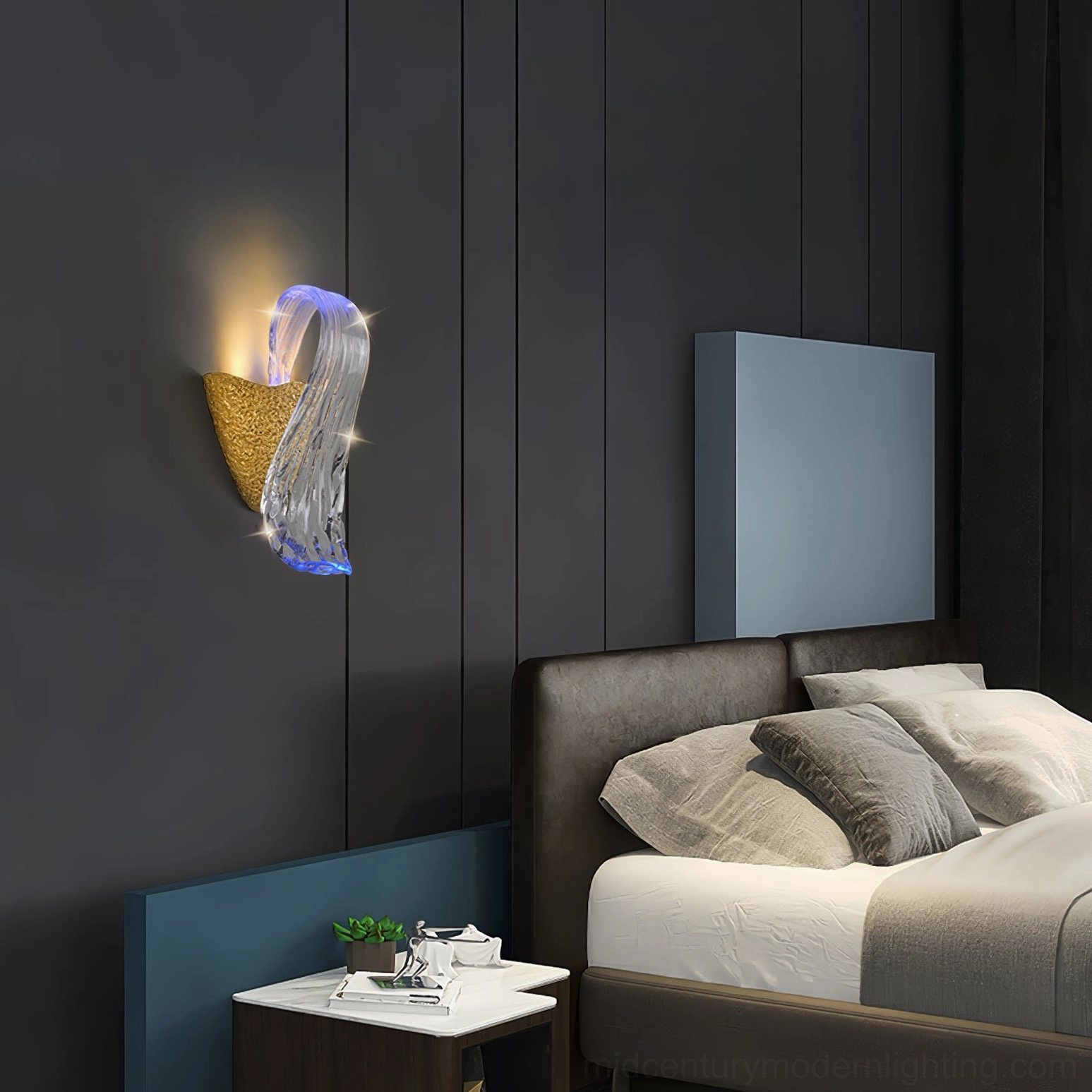 Icarus sculptural glass wall lamp showing organic curved form and brass framework integration