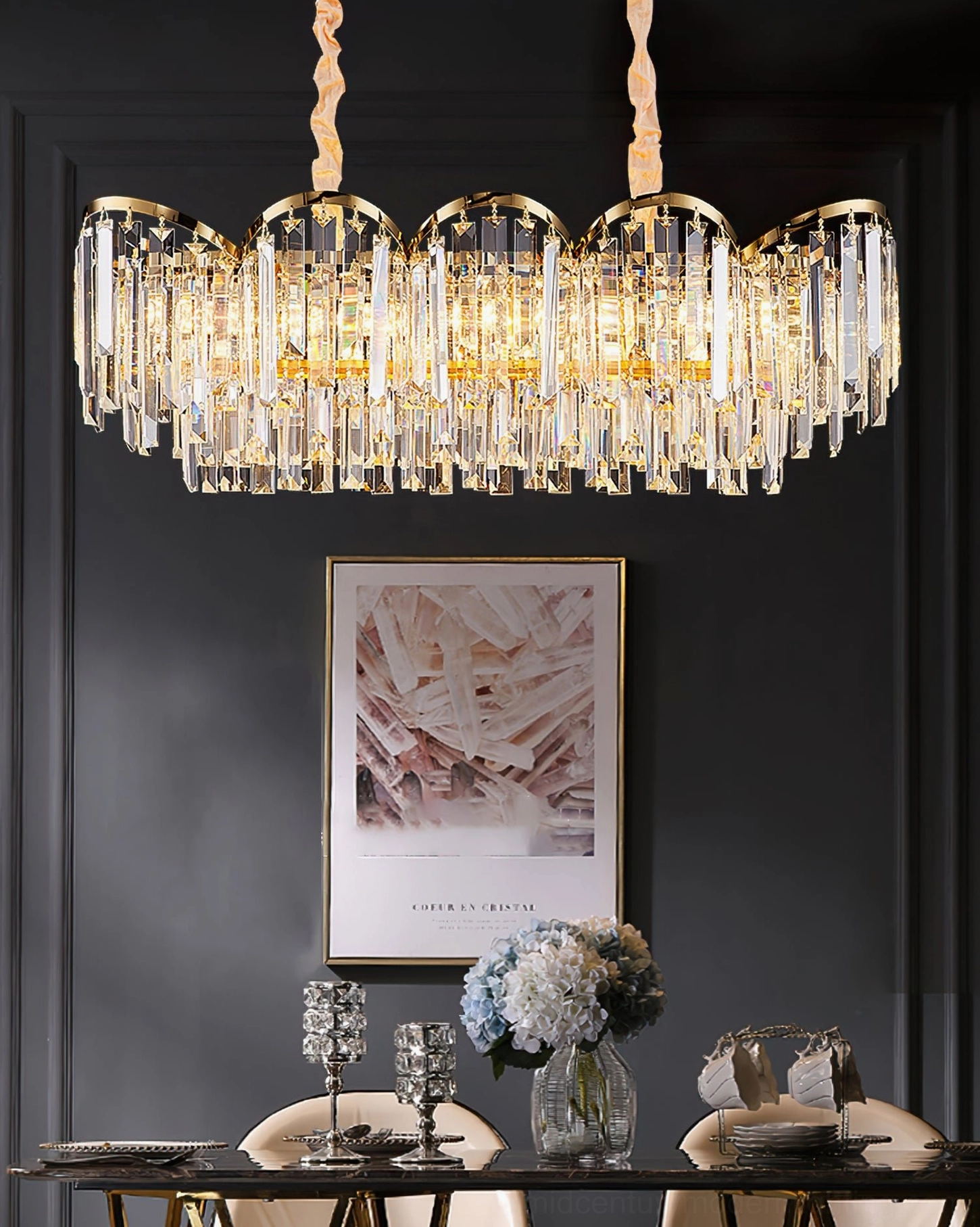 Crystal prism chandelier illuminated showing light refraction through layered hanging crystals