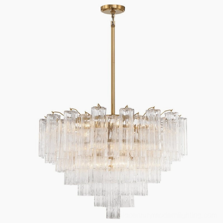 Clear hand-blown Murano glass tubular chandelier illuminated - modern glowing luxury lighting