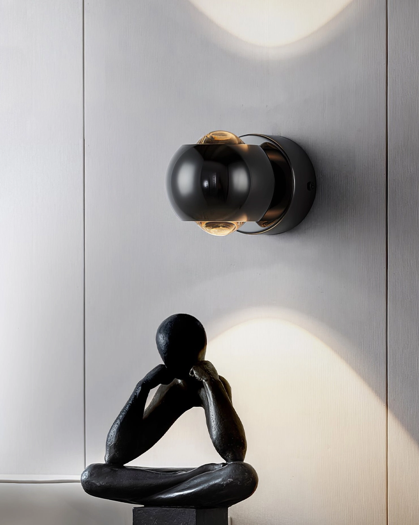 Io Verticale matte black wall lamp art gallery modern sculpture warm ambient lighting
