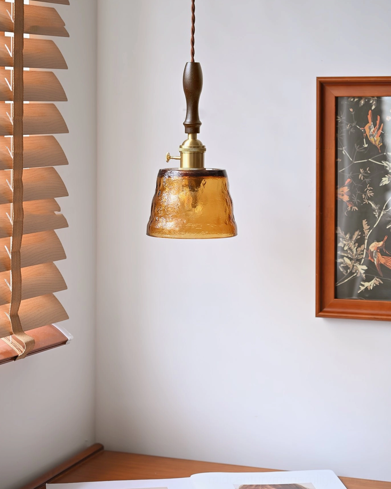Jace compact pendant light fixture with low-profile warm lighting in residential corner