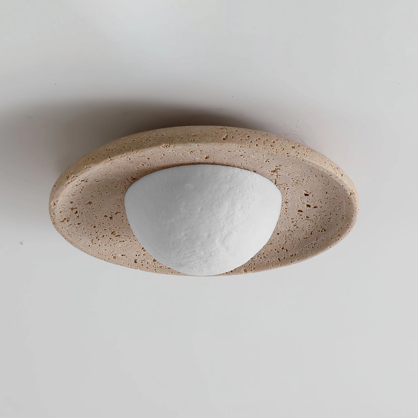 Jenny two-tone travertine flush mount ceiling light angled detail view showing wabi-sabi organic stone design