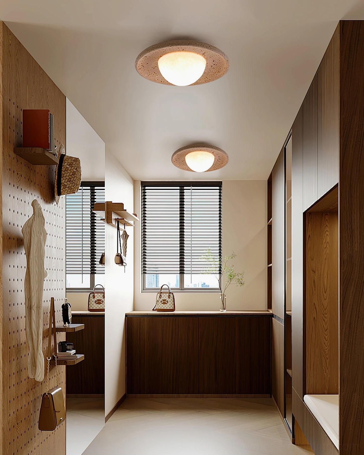 Pair of matching Jenny travertine flush mount lights in japandi style hallway corridor with warm illumination