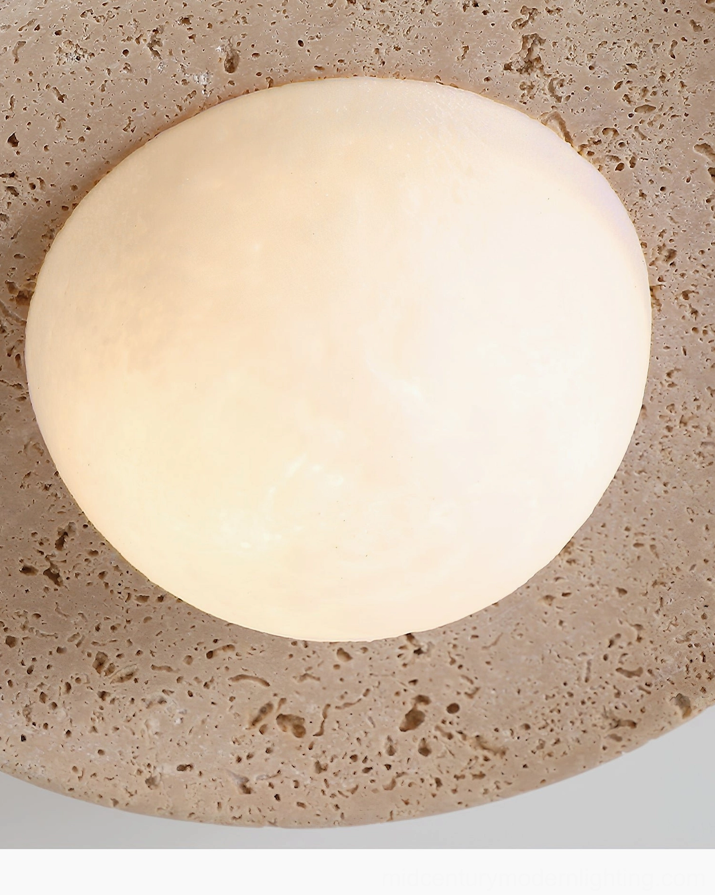 Jenny travertine ceiling fixture front view showcasing natural stone aesthetic and frosted diffuser dome design