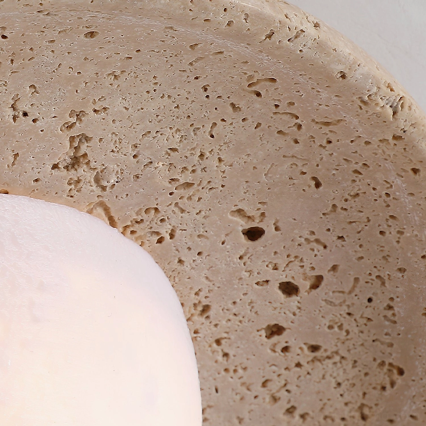 Jenny natural travertine flush ceiling light product detail showing stone texture quality and modern minimalist proportions