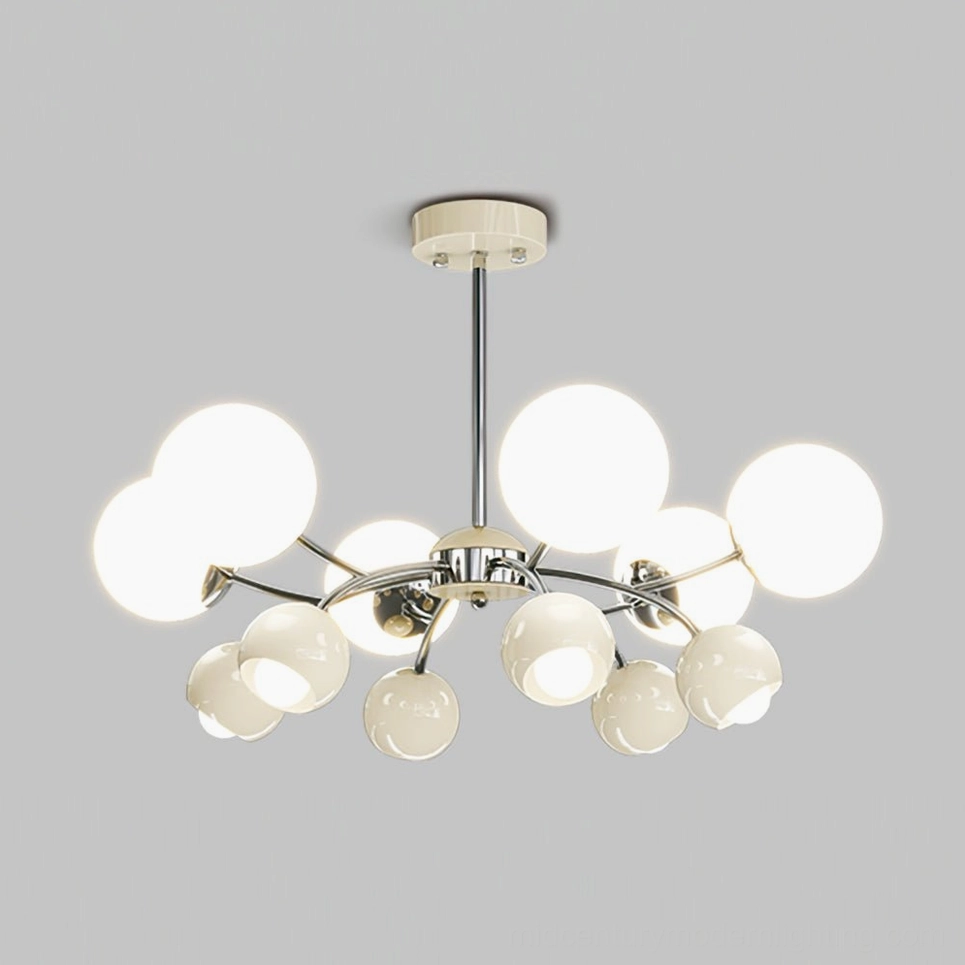 Large illuminated Jervon sputnik chandelier featuring multiple mixed-size frosted glass lamp shades with bright overhead lighting