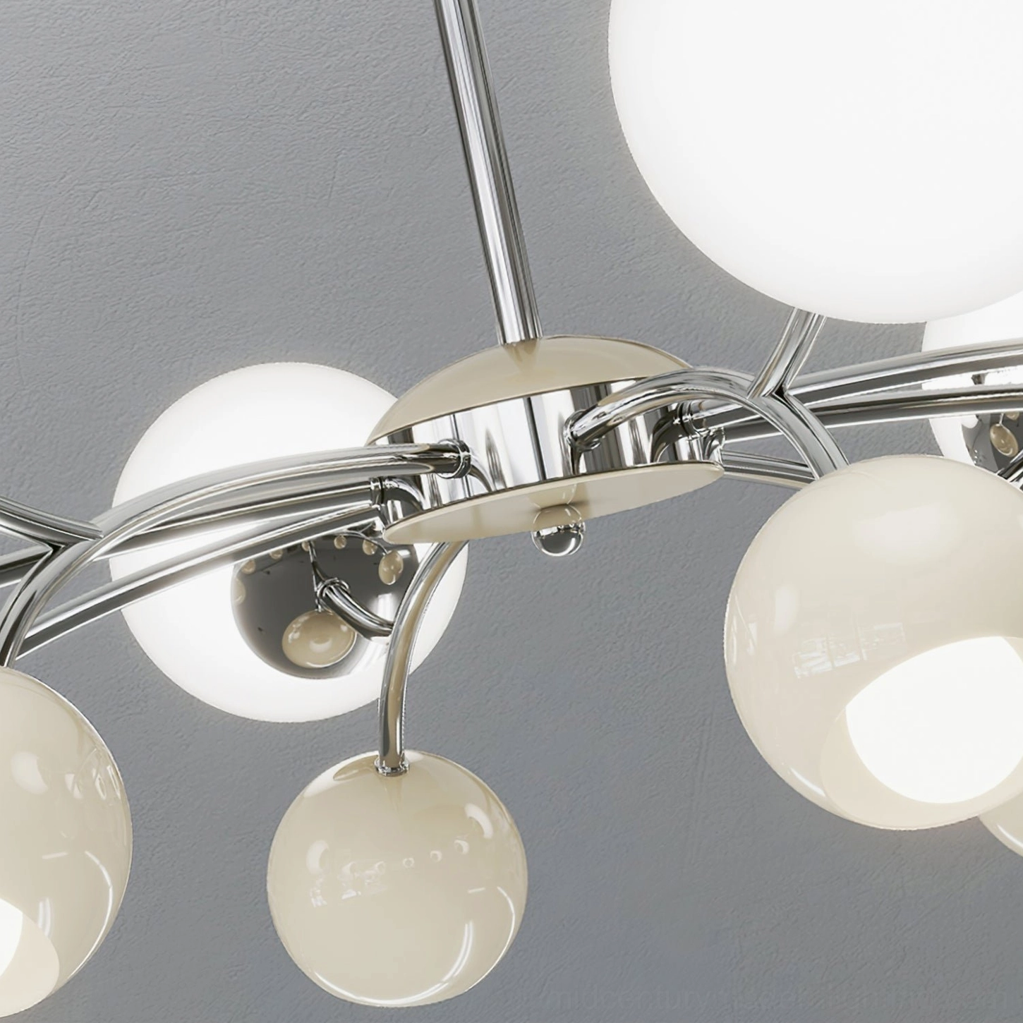Close-up detail of Jervon chandelier showing polished chrome metal arms and mixed-size frosted glass orb shades with precision craftsmanship