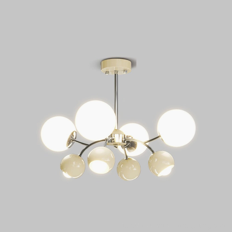 Illuminated Jervon sputnik chandelier with warm-toned metal frame and two-tone frosted glass shades emitting soft ambient light