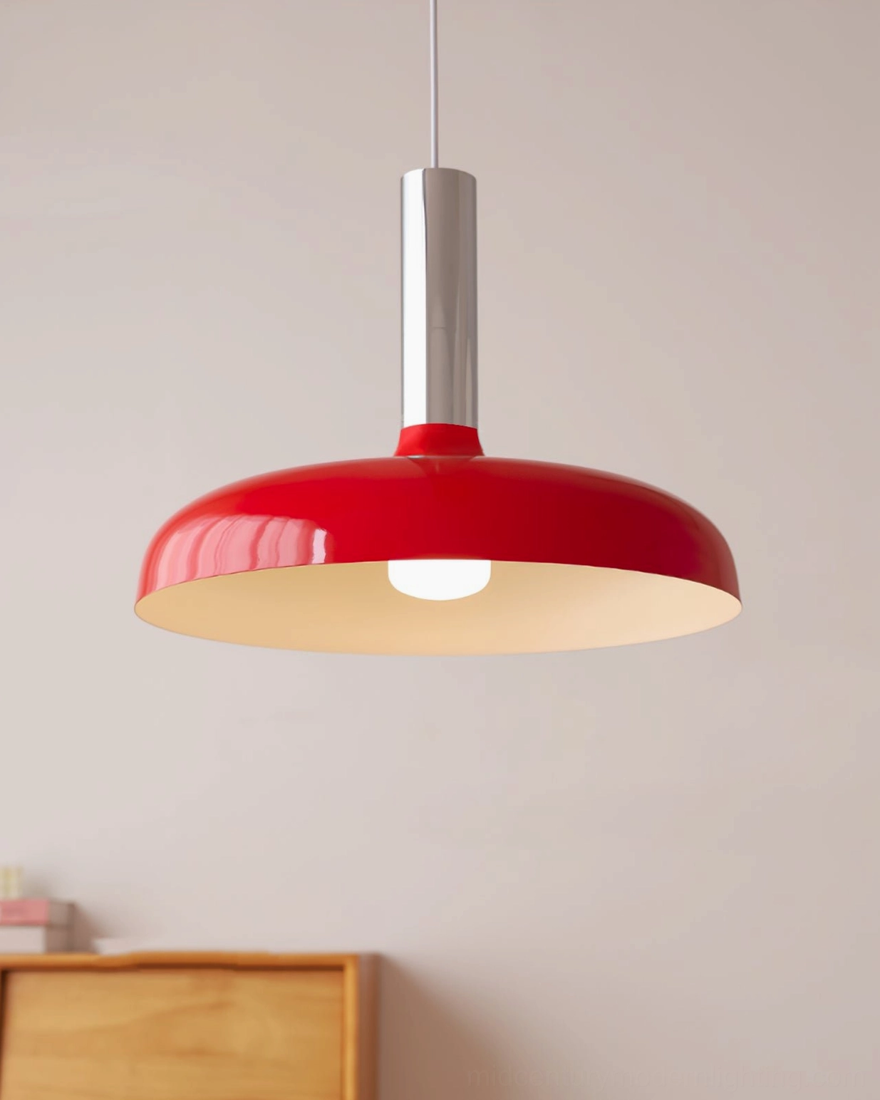 Julia pendant lamp side angle view showcasing sculptural minimalist form and finish options