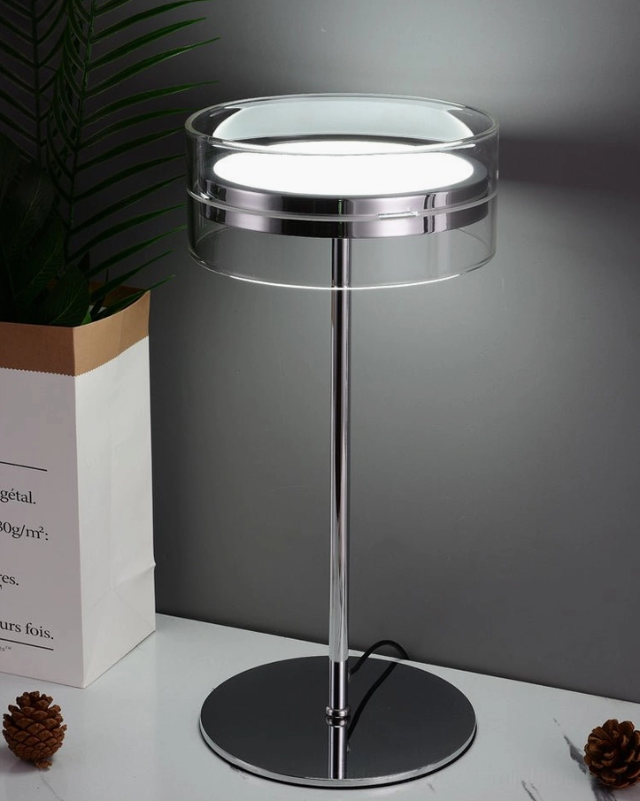 Mid-century modern bedside table lamp with clear glass shade and polished hardware, bedroom lighting