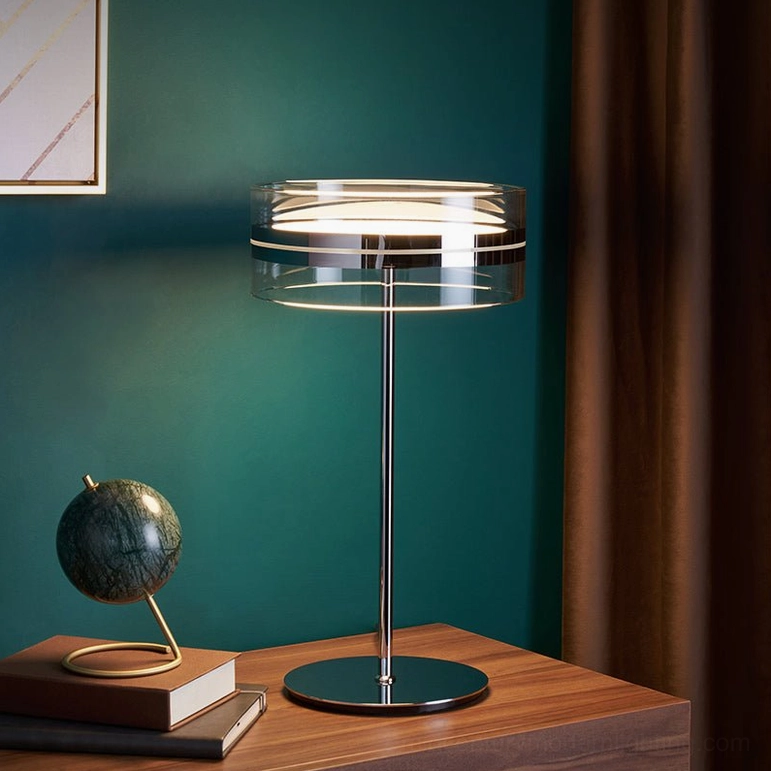 Modern acrylic shade table lamp with chrome metal components, close-up detail view