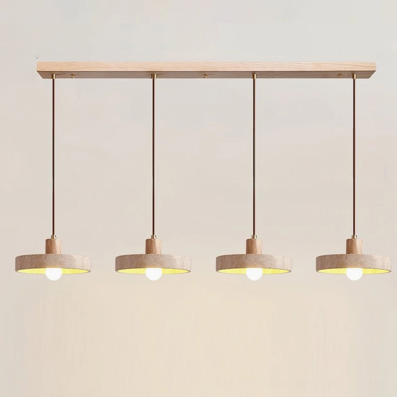 Four Kairi travertine pendants in natural wood finish creating statement lighting installation