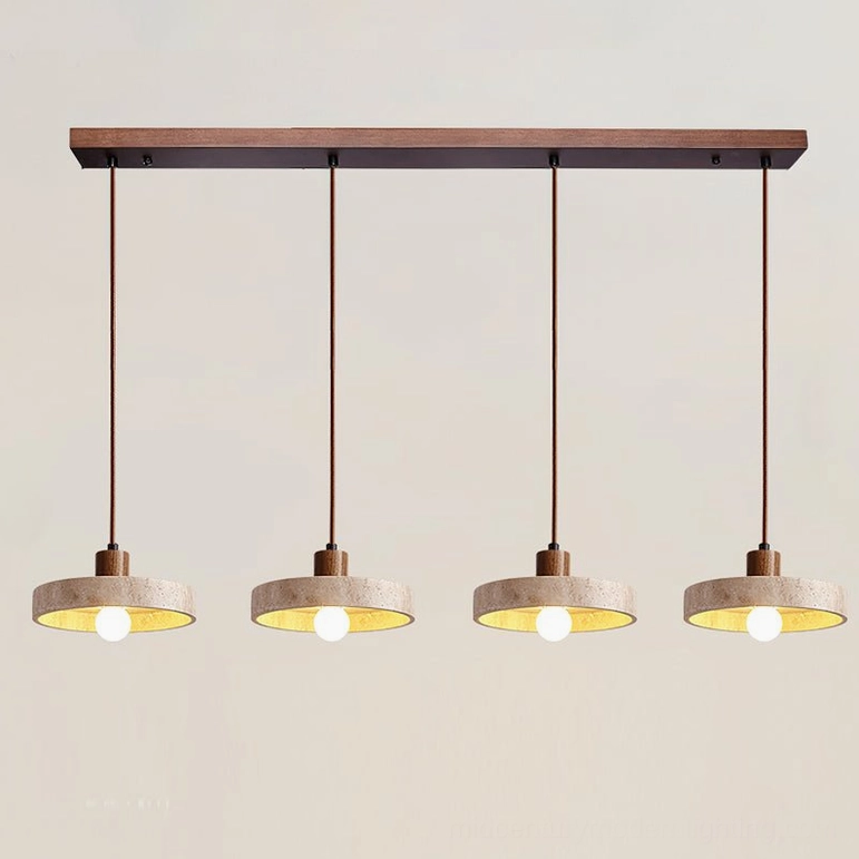 Four Kairi stone pendant lights in walnut wood finish installed in modern minimalist interior