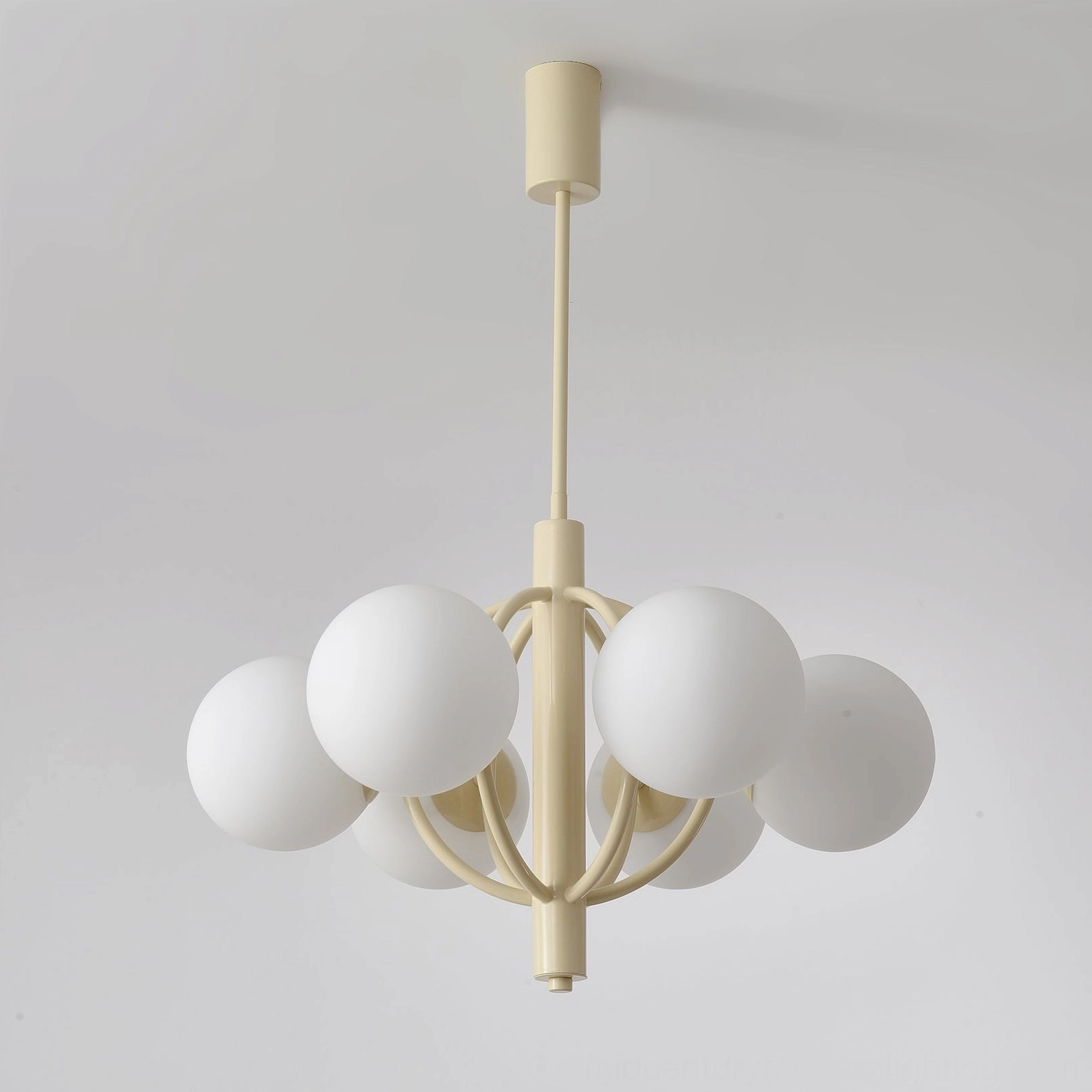 Kaiser 6-head modern chandelier with smooth matte white glass shades and cream metal frame