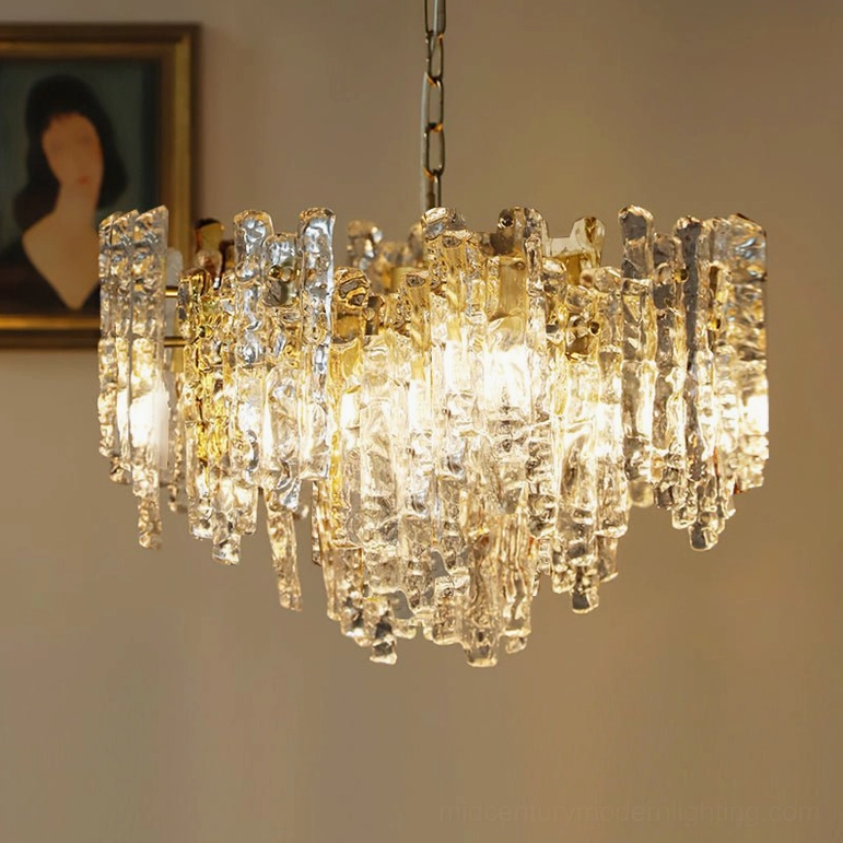 Kalmar grand 21.7 inch diameter clear and gold glass pendant light creating dramatic illumination in grand interiors