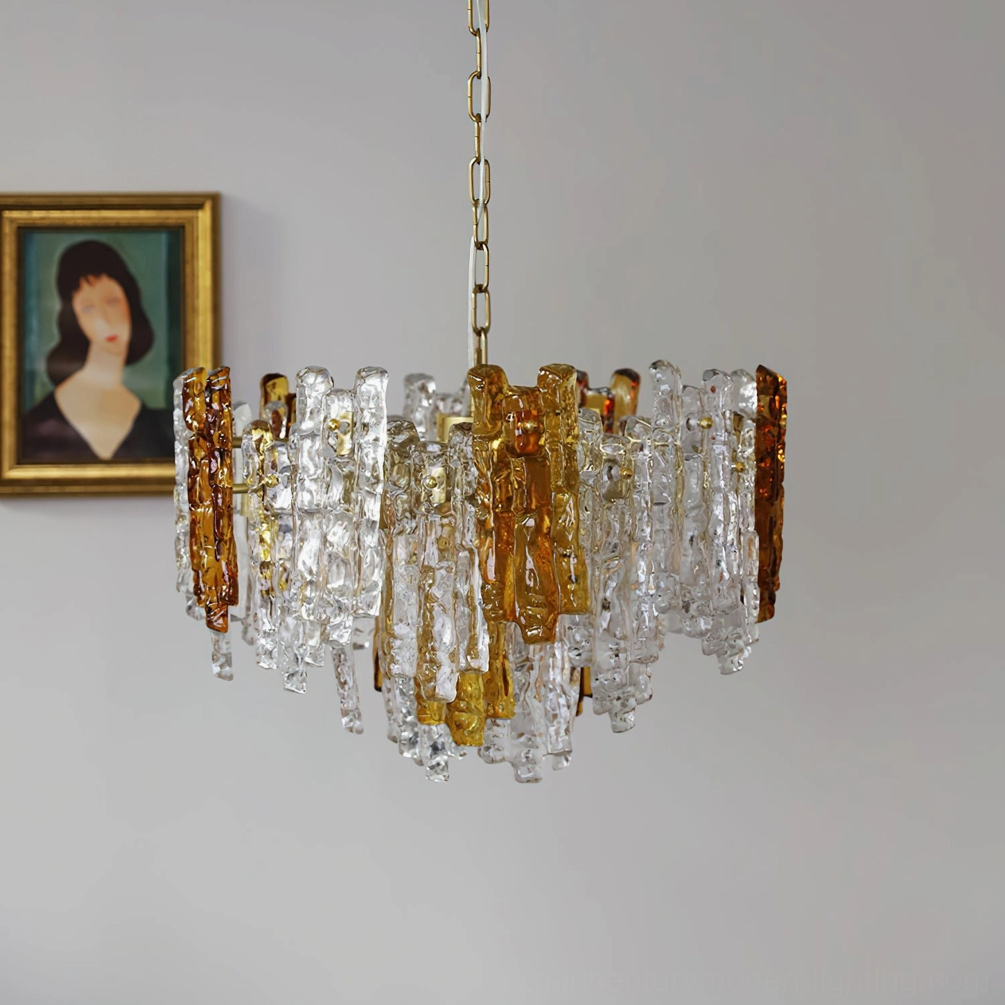 Kalmar staggered glass panel pendant light with gold metal frame displaying sculptural layered design in side view