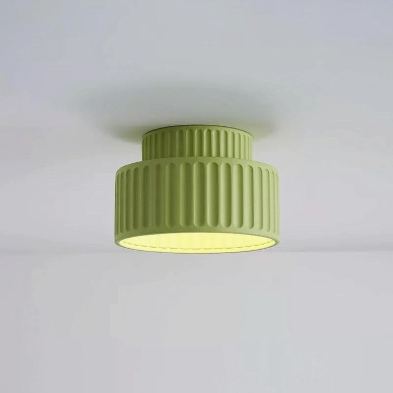 Kami ceiling lamp green variant in modern home office workspace with natural lighting and minimalist décor
