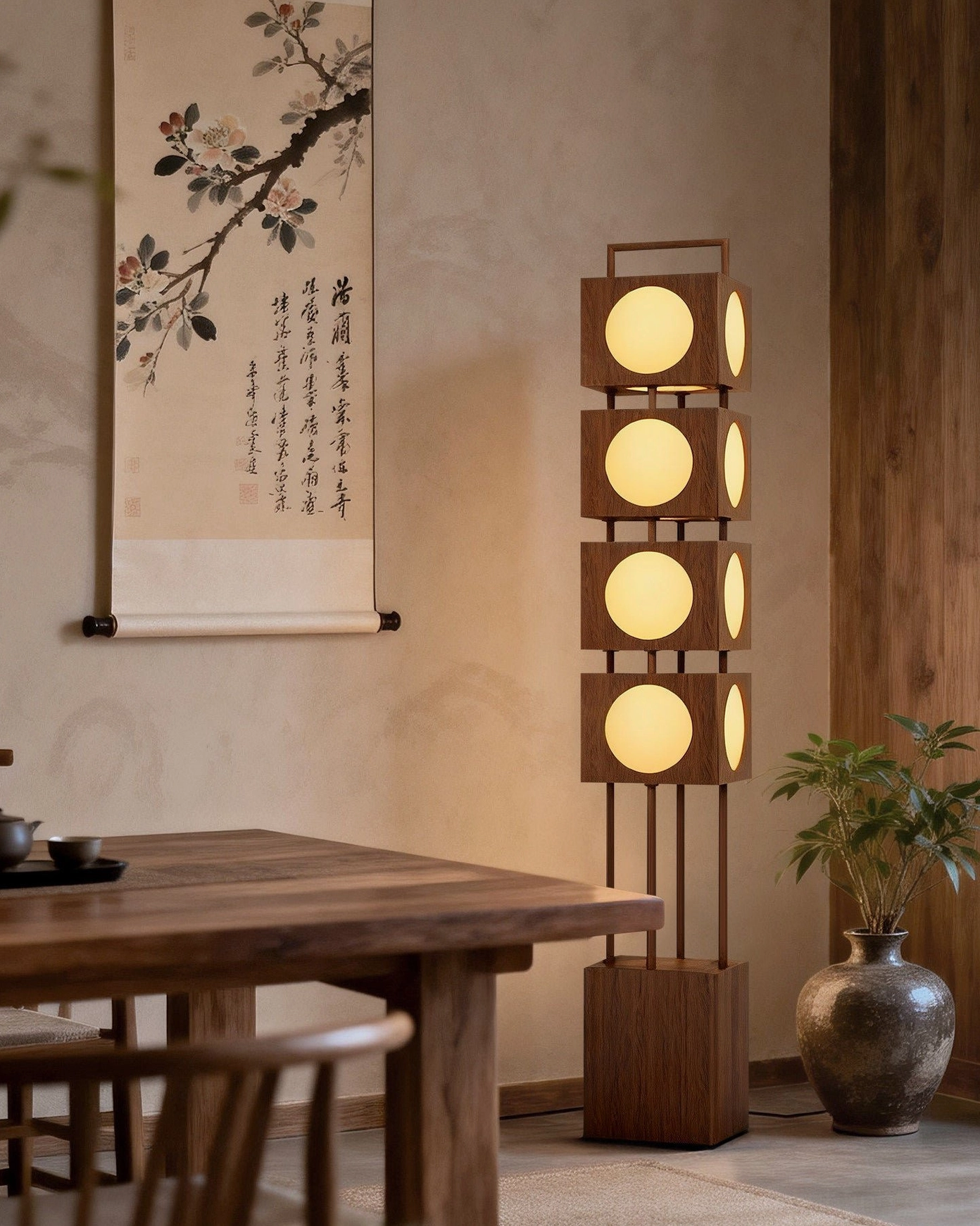 Kano Totem Floor Lamp in oriental dining room with wooden table, calligraphy wall hanging, potted plant, ambient warmth