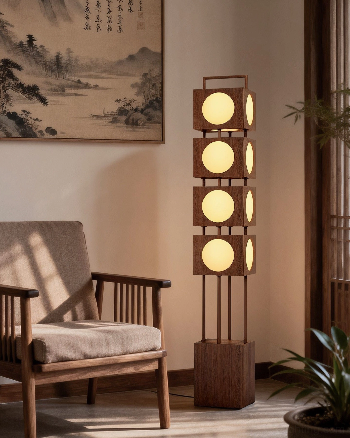 Kano Totem Floor Lamp in cozy reading corner with wooden armchair, potted green plant, warm frosted light diffusion