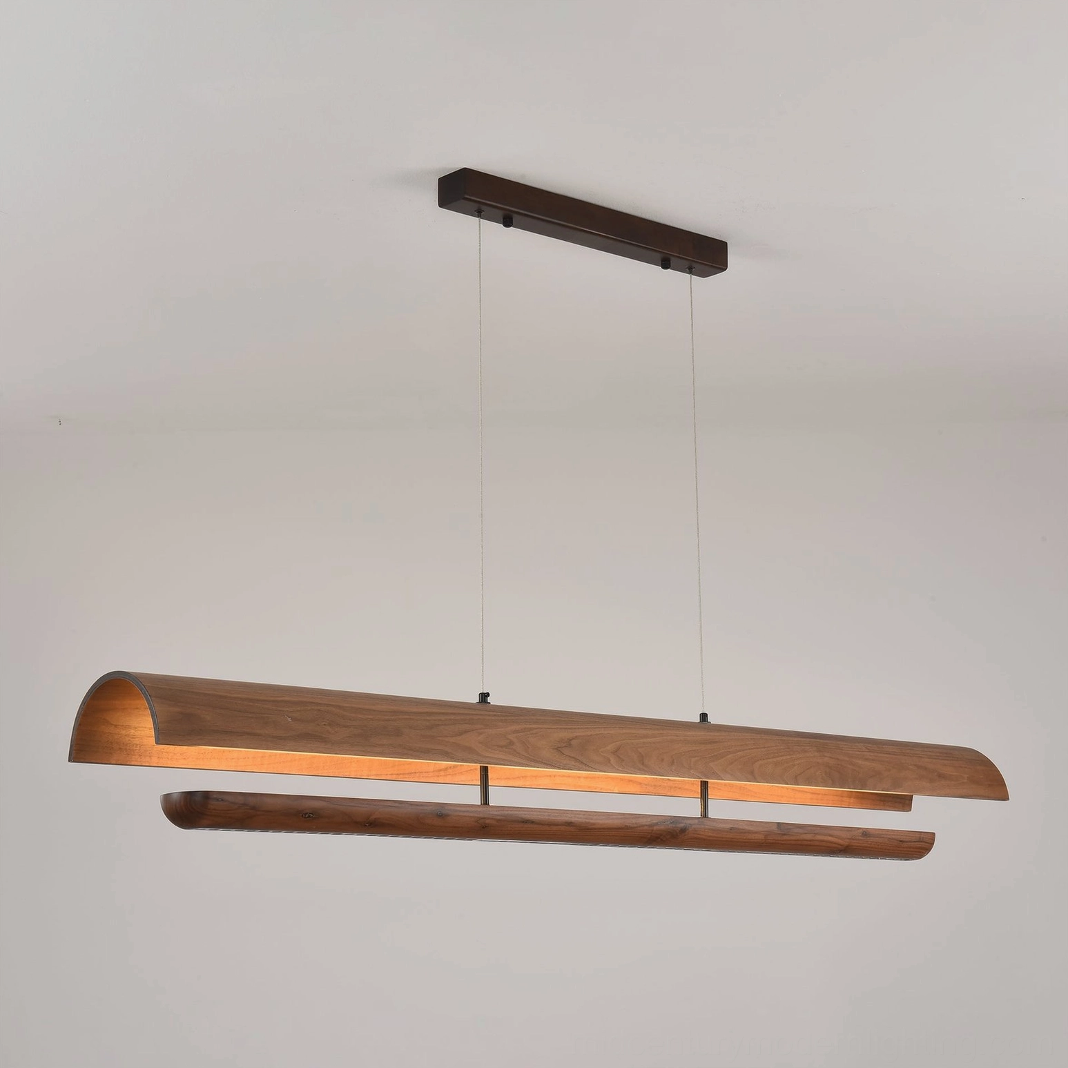 Kanoe linear wooden pendant chandelier front low-angle view showing suspension wires and walnut wood design