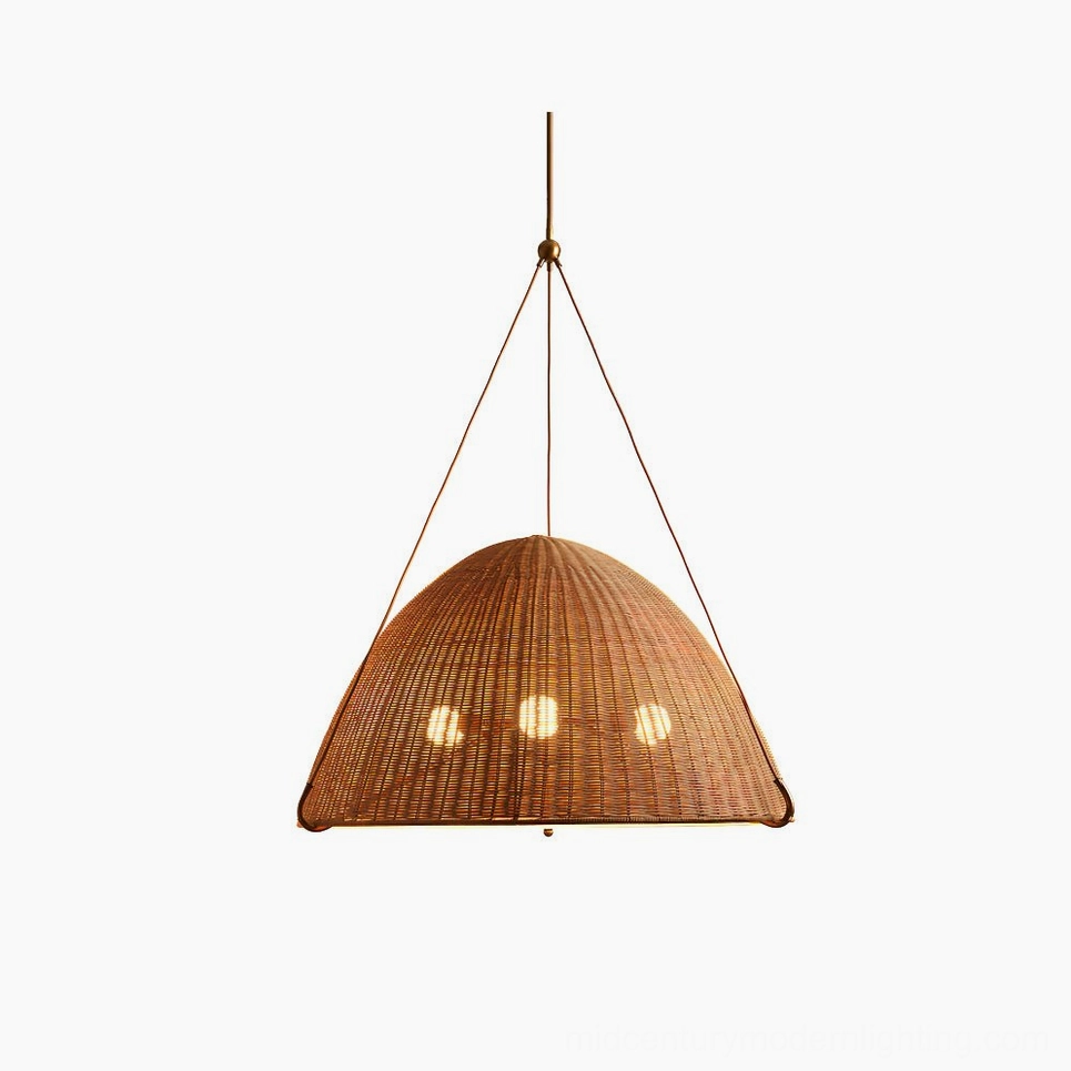 Kash natural rattan dome pendant light with gold metal frame, studio front view
