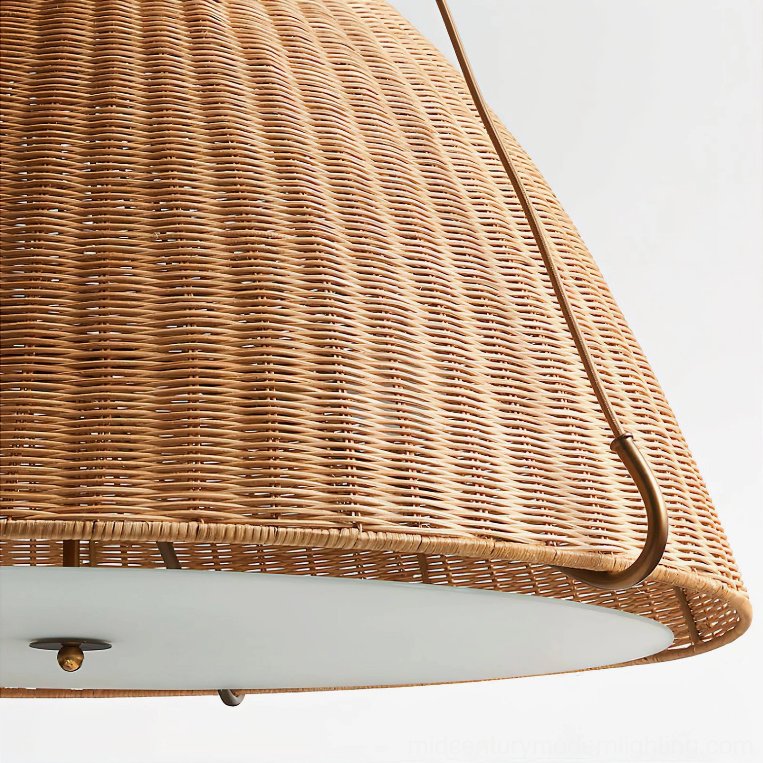 Kash handwoven rattan pendant light suspended creating focal point in contemporary home space