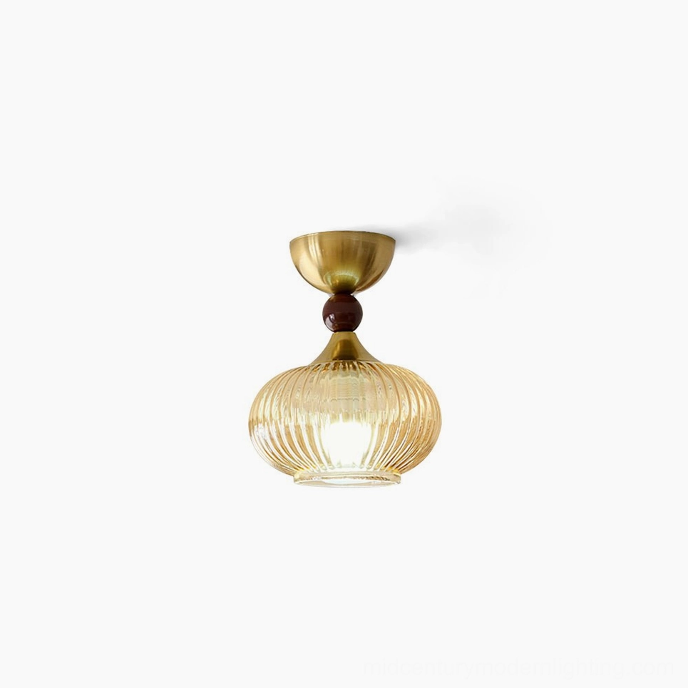 Kaydan ribbed amber glass flush mount ceiling lamp front view studio shot mid-century modern design